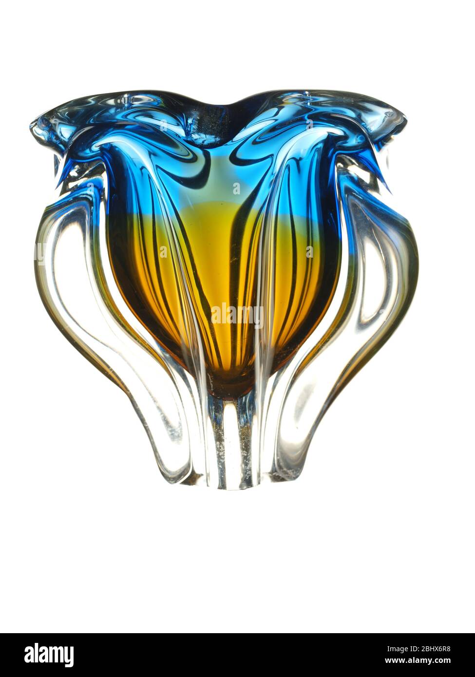 Glass multicolored vase in the shape of a bud of an exotic flower isolated on a white