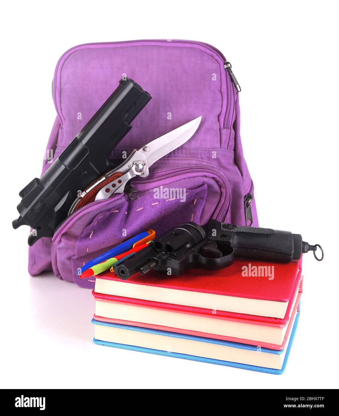 Gun in school backpack, isolated on white Stock Photo Alamy