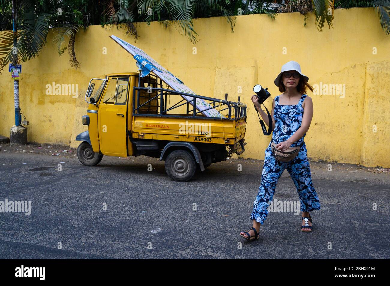 Traveling female Vietnamese photographer, Kochi, India Stock Photo