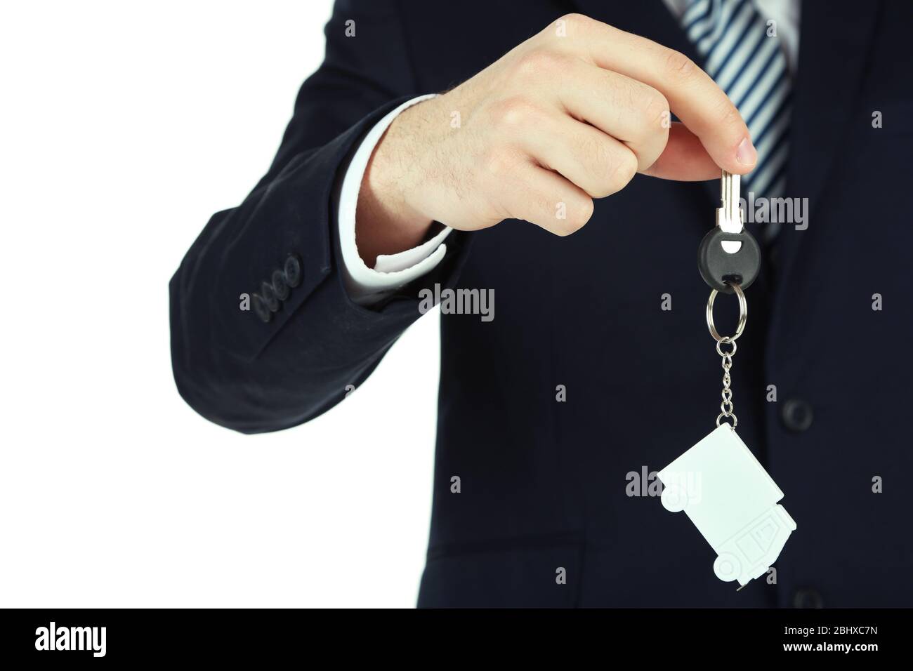Hand with keys isolated on white Stock Photo - Alamy
