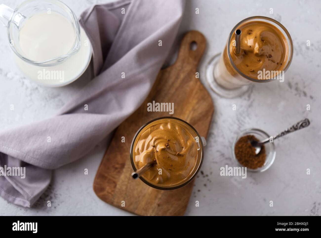 Dalgon coffee, a trendy Korean drink in high key. View from above Stock Photo