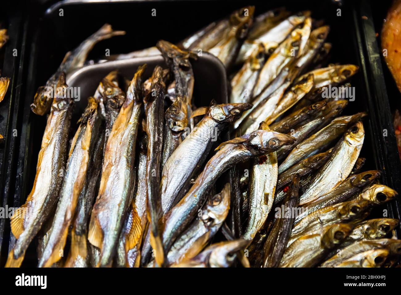 Cured herring and other fish in supermarket Stock Photo Alamy