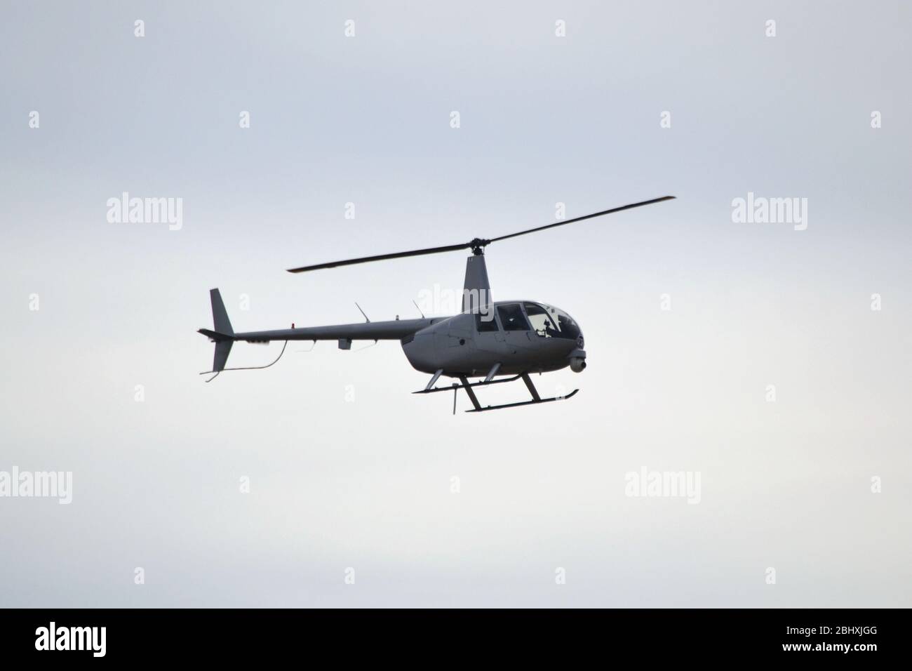 Helicopter flying in mid hi-res stock photography and images - Alamy