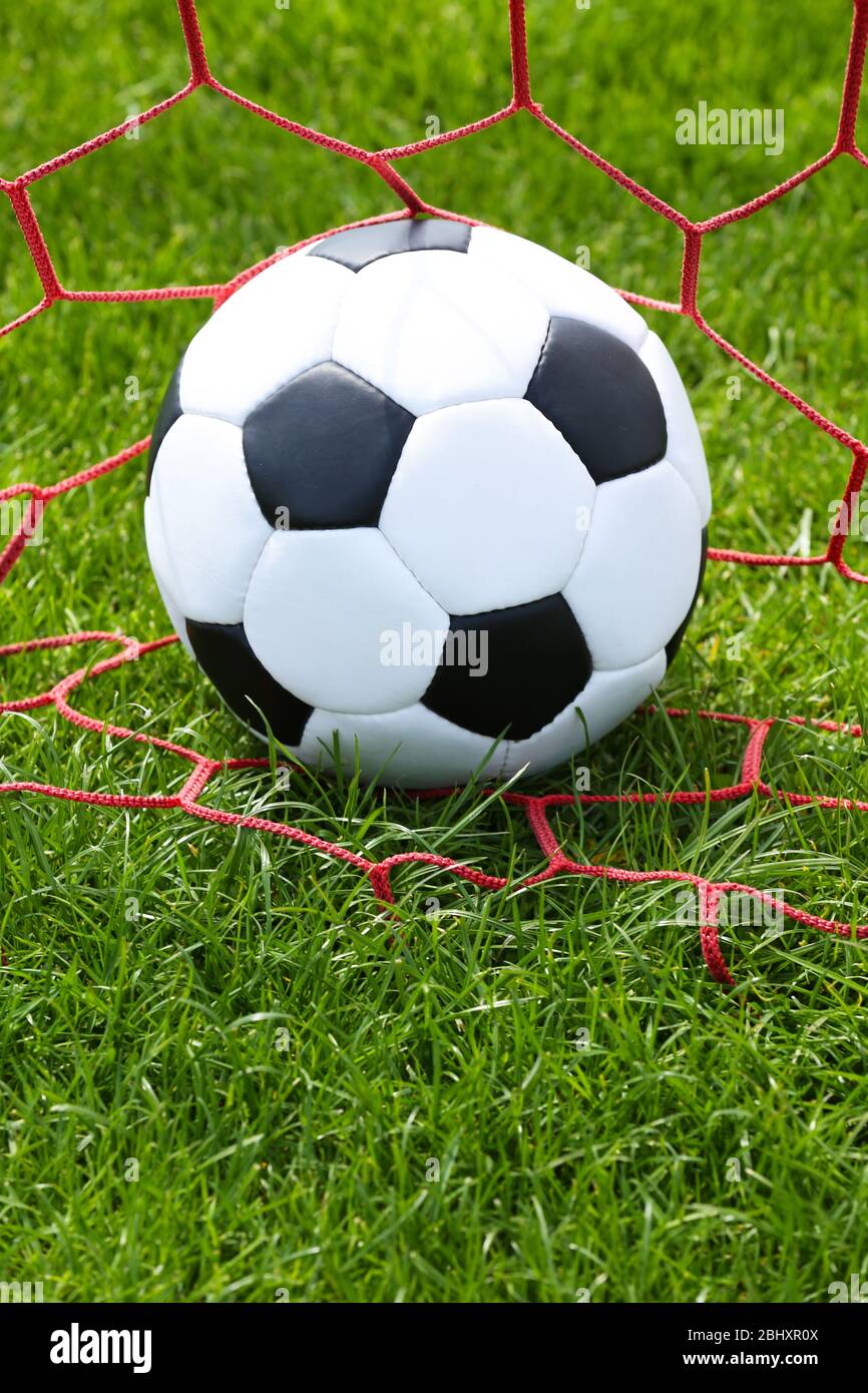 soccer ball in goal Stock Photo - Alamy