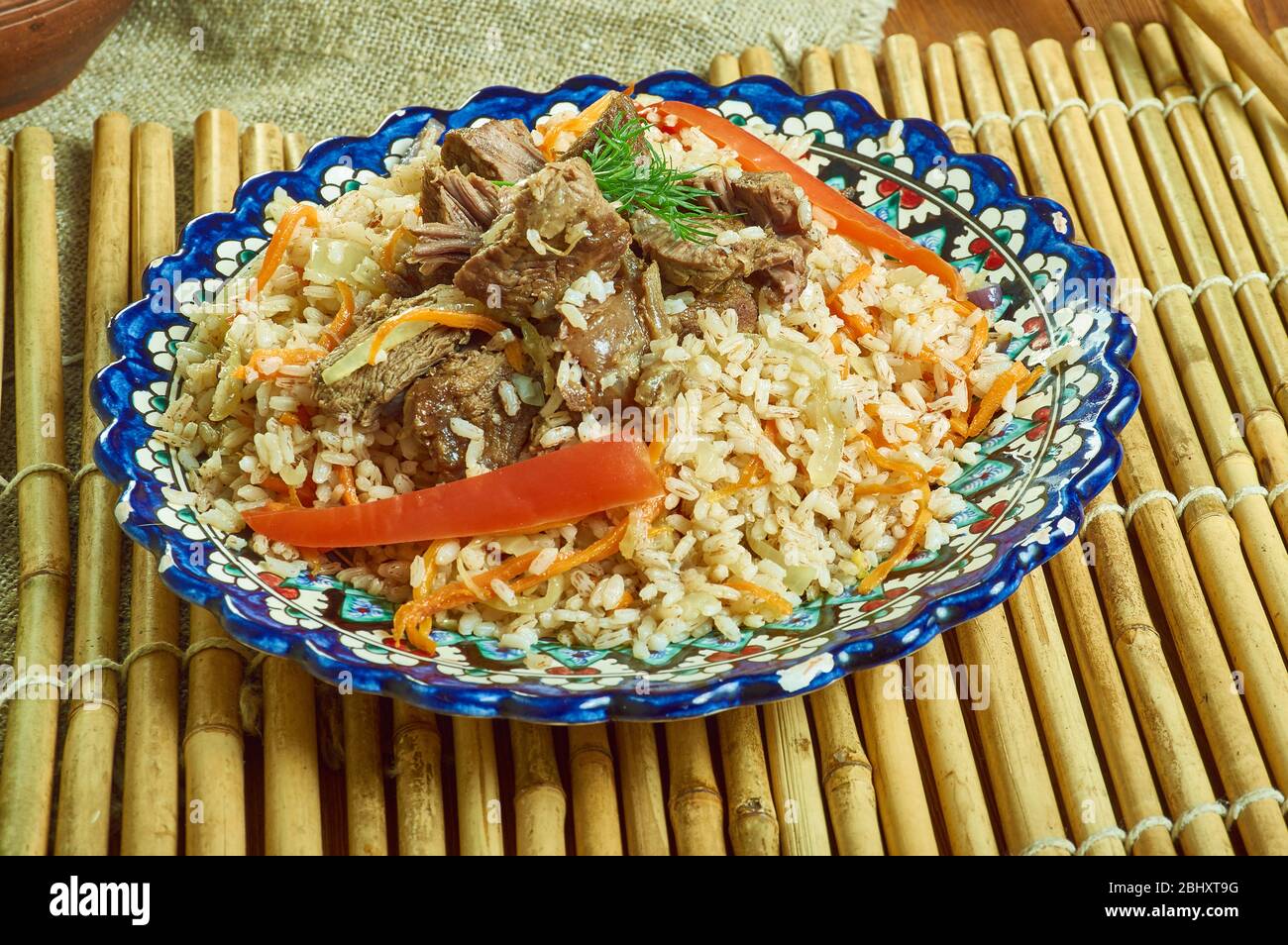 Chorezmskiy Uzbek plov Chalov, authentic rice and lamb dish for a party from the heart of Middle Asia Stock Photo