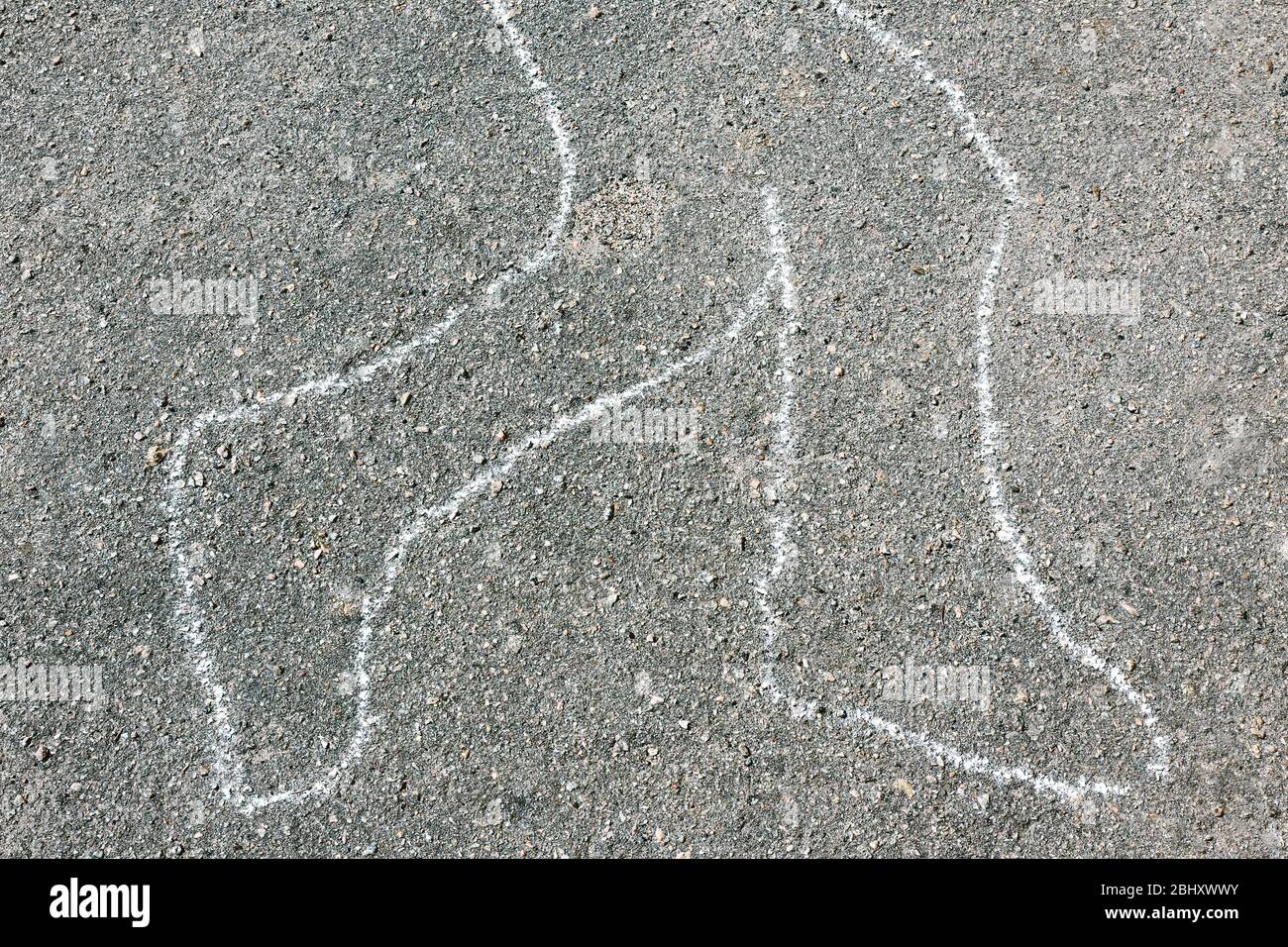 Chalk outline of body dead on pavement Stock Photo