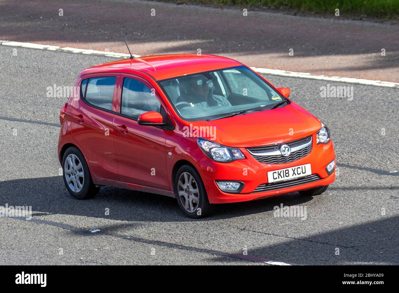 2018 red Vauxhall Viva SE; Vehicular traffic moving vehicles, driving vehicle on UK roads, motors, motoring on the M6 motorway highway. Stock Photo
