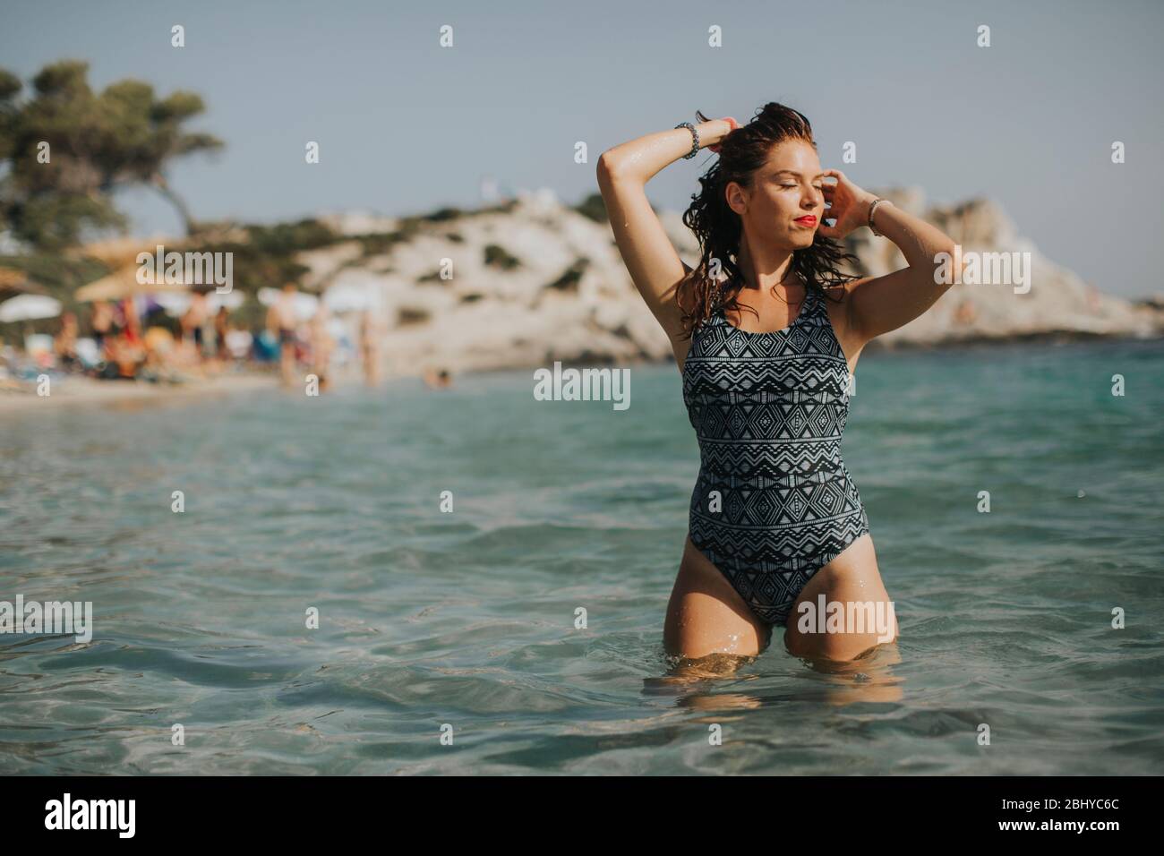 Beautiful greek woman in bikini hi-res stock photography and images - Alamy