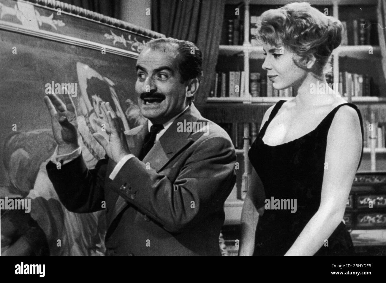 Totò, Eva e il pennello proibito Year: 1959 - Italy / France / Spain Louis  de Funès, Abbe Lane Director: Steno Stock Photo - Alamy