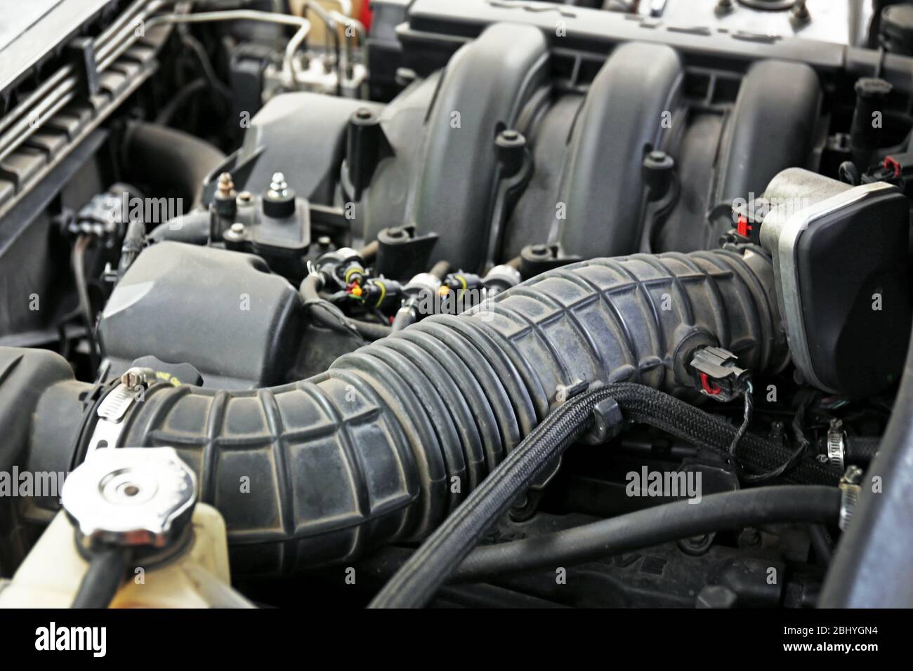 Engine under hood of car Stock Photo - Alamy