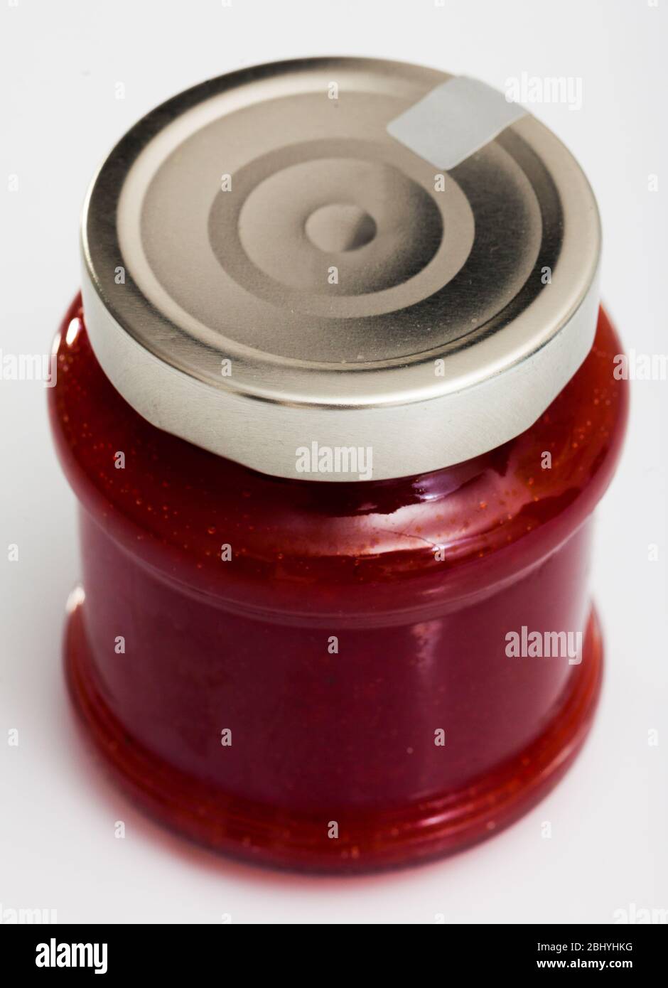 Strawberry jam in a glass jar Stock Photo - Alamy
