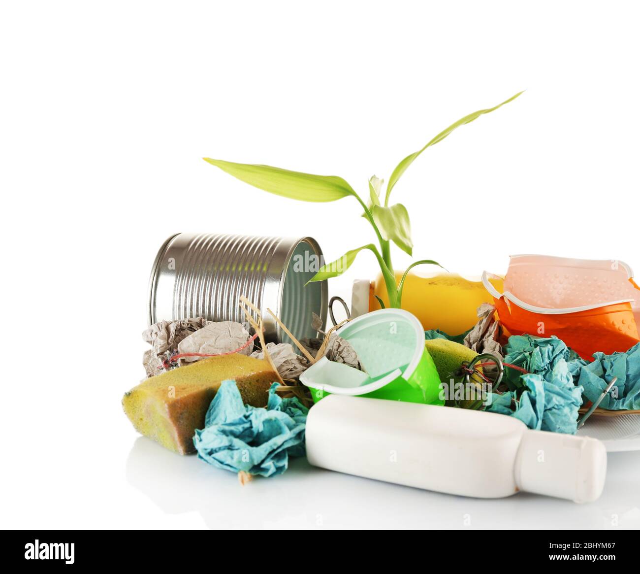 Pile of rubbish with plant isolated on white Stock Photo Alamy