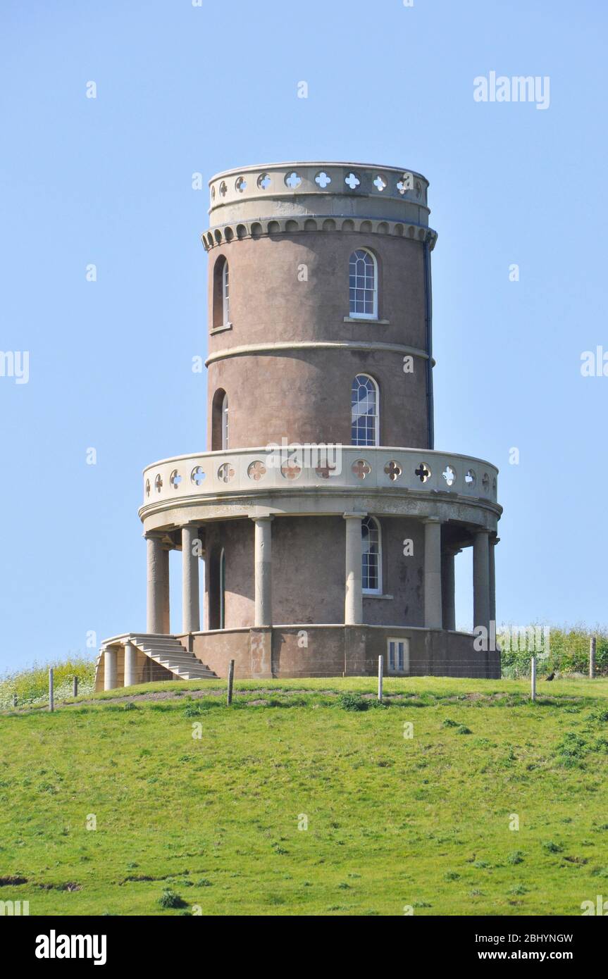 Kimmeridge Tower, also known as Clavell Folly was originally built in 1830 but in 2006 it was rebuilt 25 metres back from the edge of Hen Cliff on the Stock Photo