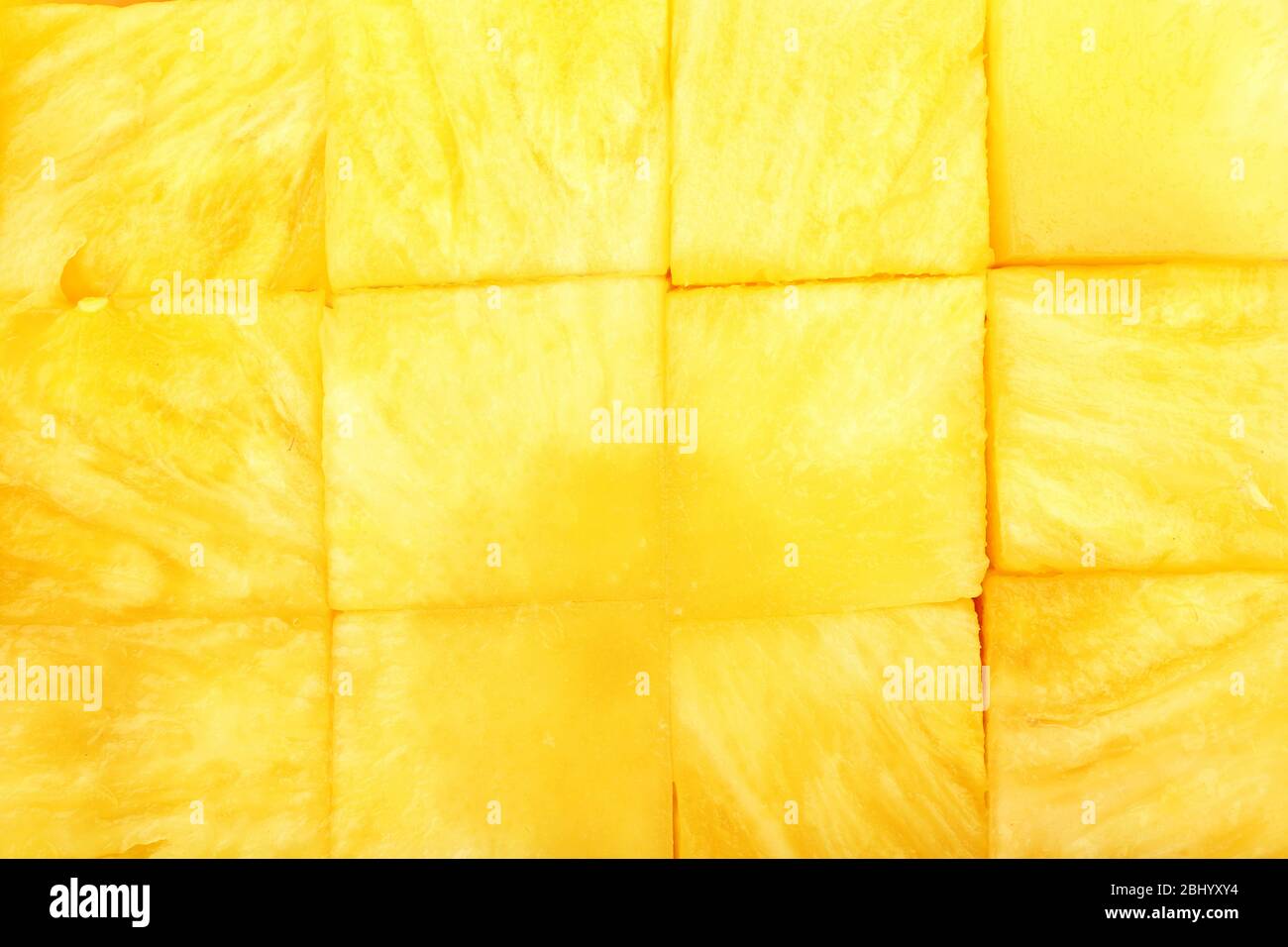 Fresh sliced pineapple cubes close up Stock Photo