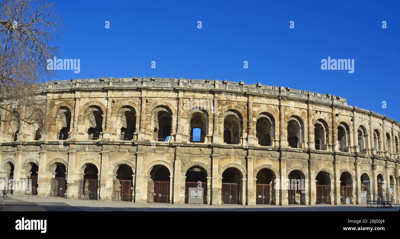 Amphitheaters Arches in the outer wall of the Ancient Roman Amphitheatre at Nimes in ...