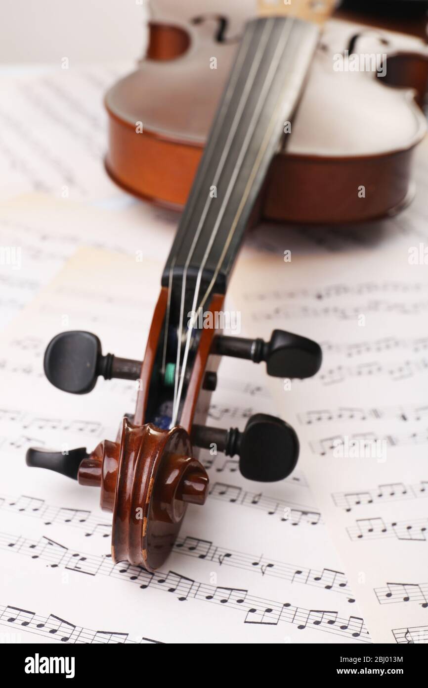 Classical violin on music sheets background Stock Photo