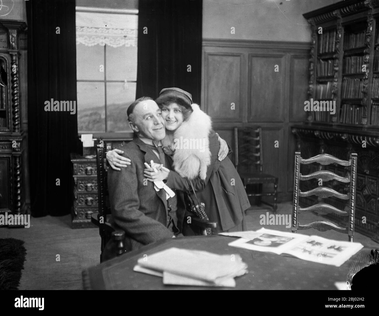 A scene from ' Everybody ' s Business ' a food economy film . - Miss Renee Kelly and Mr Norman KcKinnel . - 1917 - Stock Photo