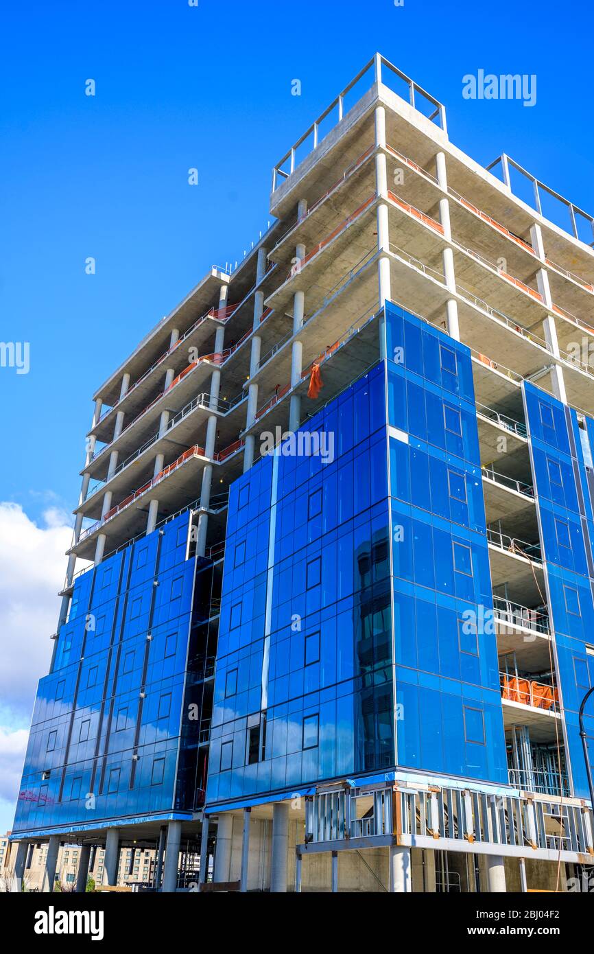 building exterior walls on The Construction Of A Multi Story Building With A Concrete Monolithic Frame Continues With The Exterior Walls Lined With Glass Vacuum Panels With A Me Stock Photo Alamy
