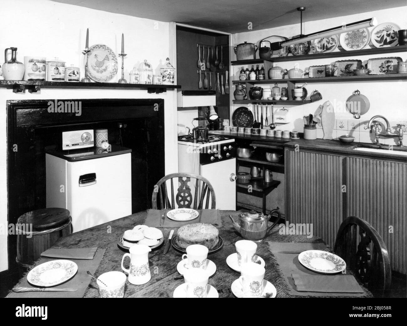 Basement kitchen of London house furnished to look as little like a kitchen as possible - 22 March 1969 Stock Photo