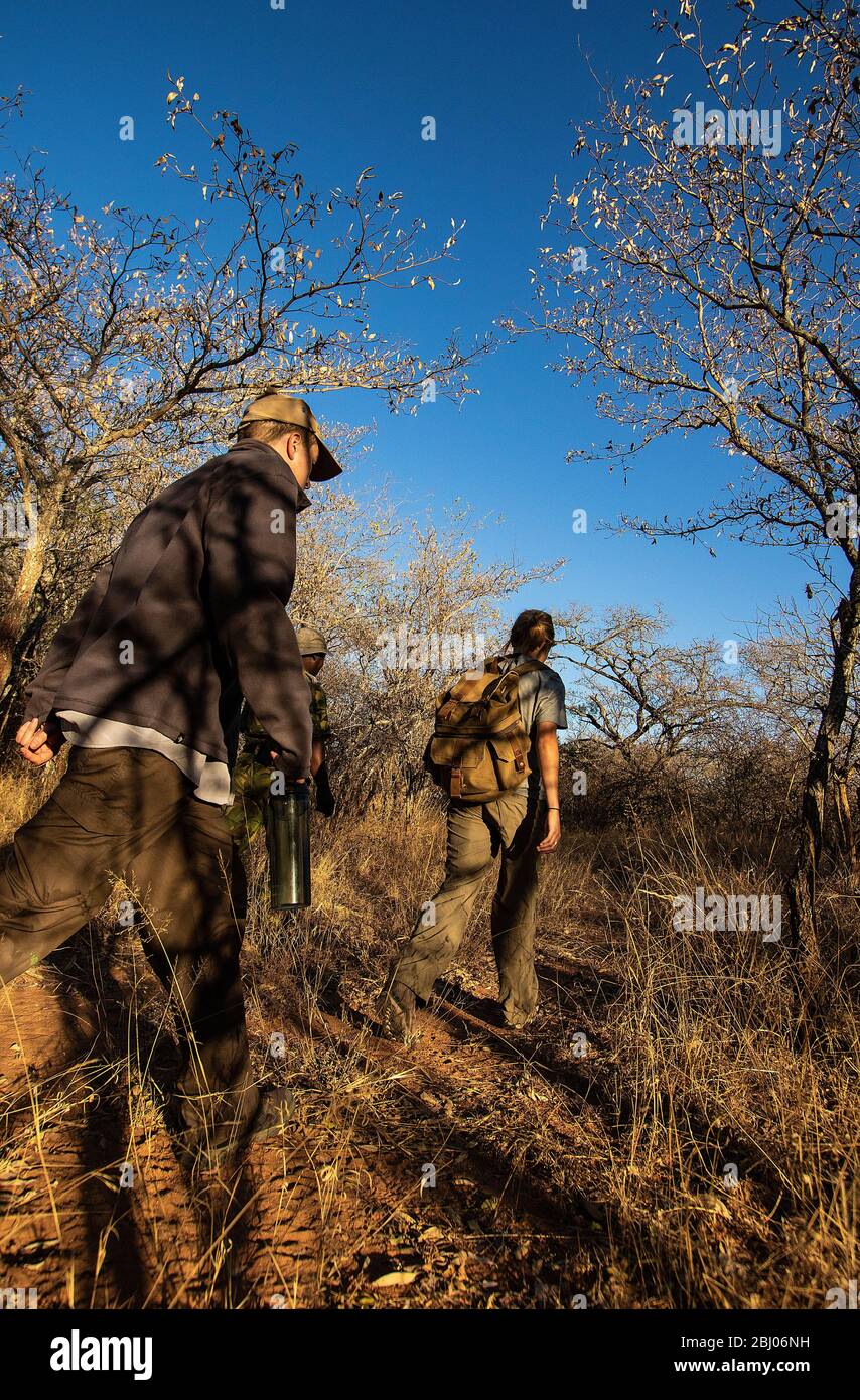 Volunteers with anti-poaching unit patrols  in Timbavati Game Reserve, South Africa Stock Photo