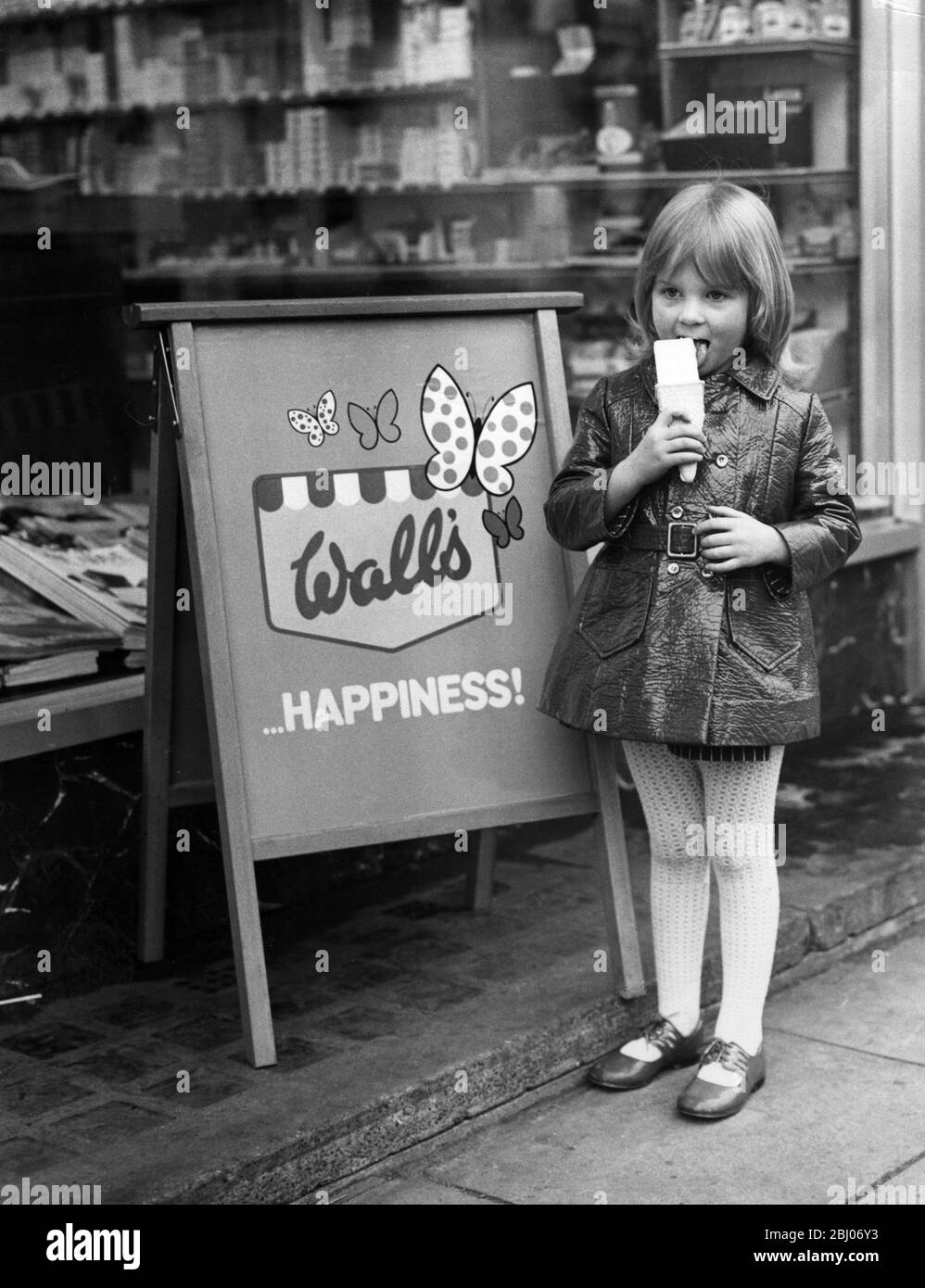 Young girl enjoying her Wall's ice cream Stock Photo