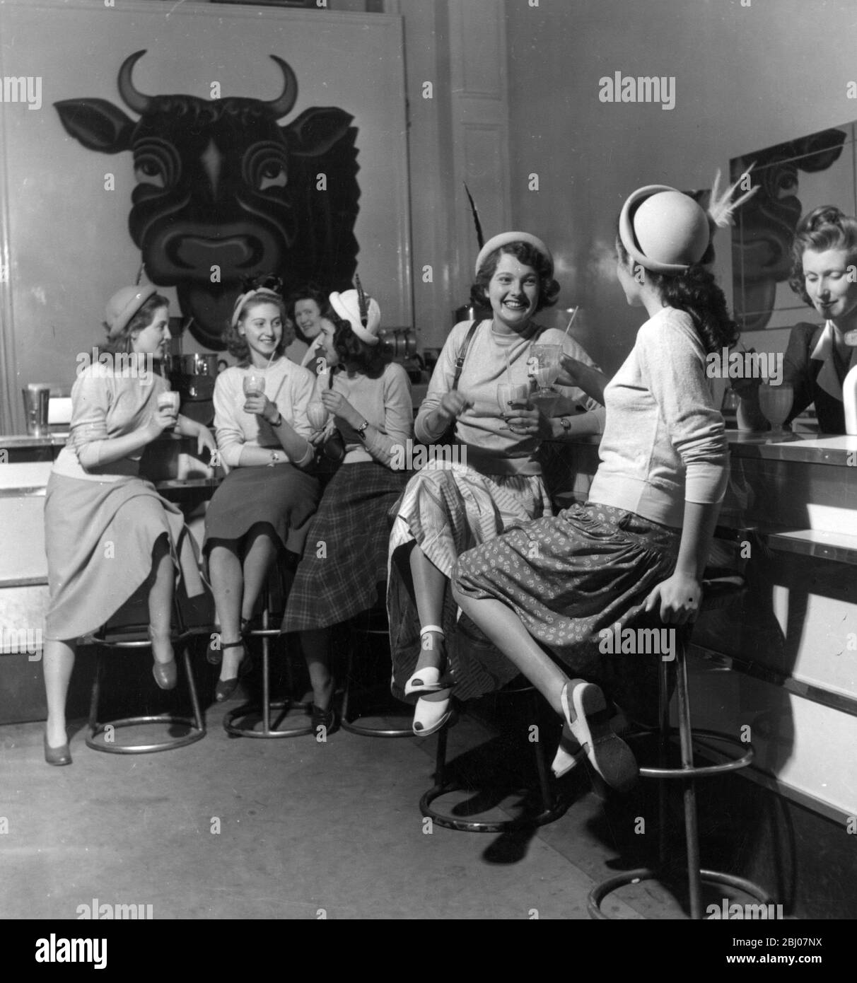 Interior of cafe in 1949 showing women chatting Stock Photo