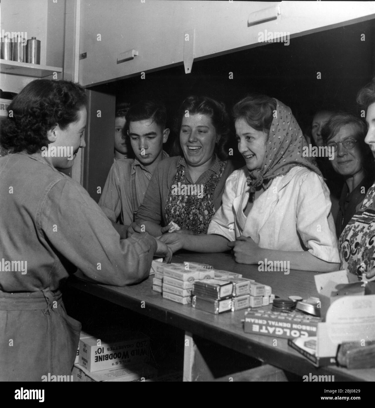 The Wedgewood Pottery works canteen boasts a tuck shop where the workers can buy cigarettes. - c.1947 - Stock Photo