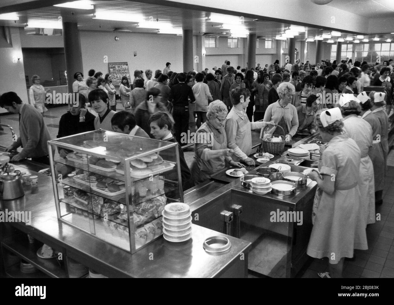 Lunch time at the new canteen of Rank Bush Murphy's Plymouth factory, England. - January 1970 Stock Photo