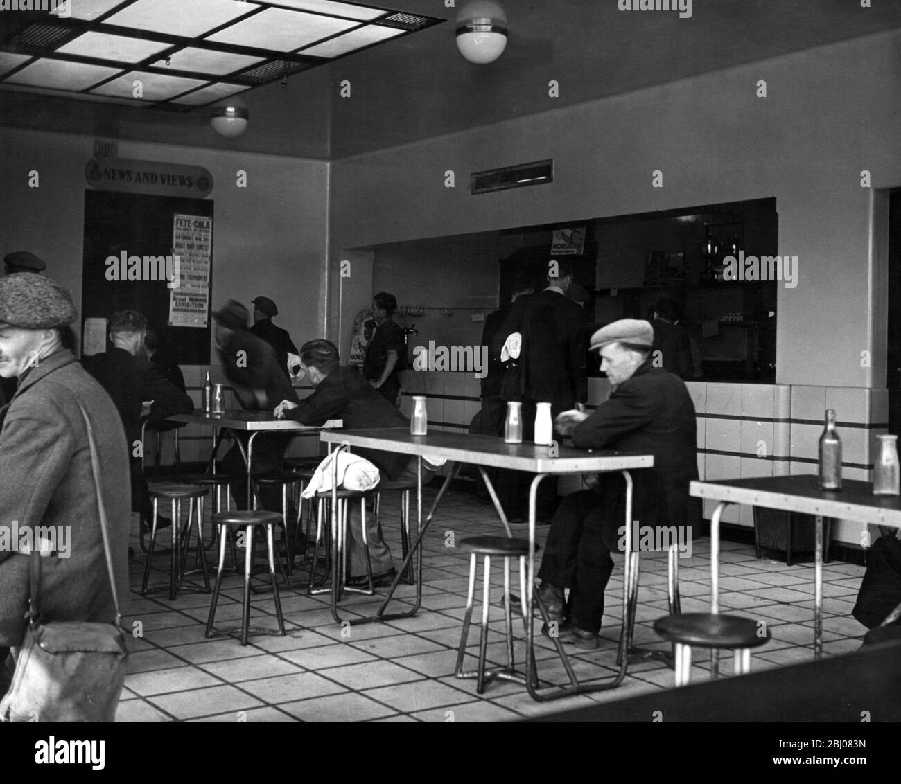 A new milk bar at the pit-head is offered to the workers in the canteen of a coal mine. - 17 September 1947 Stock Photo