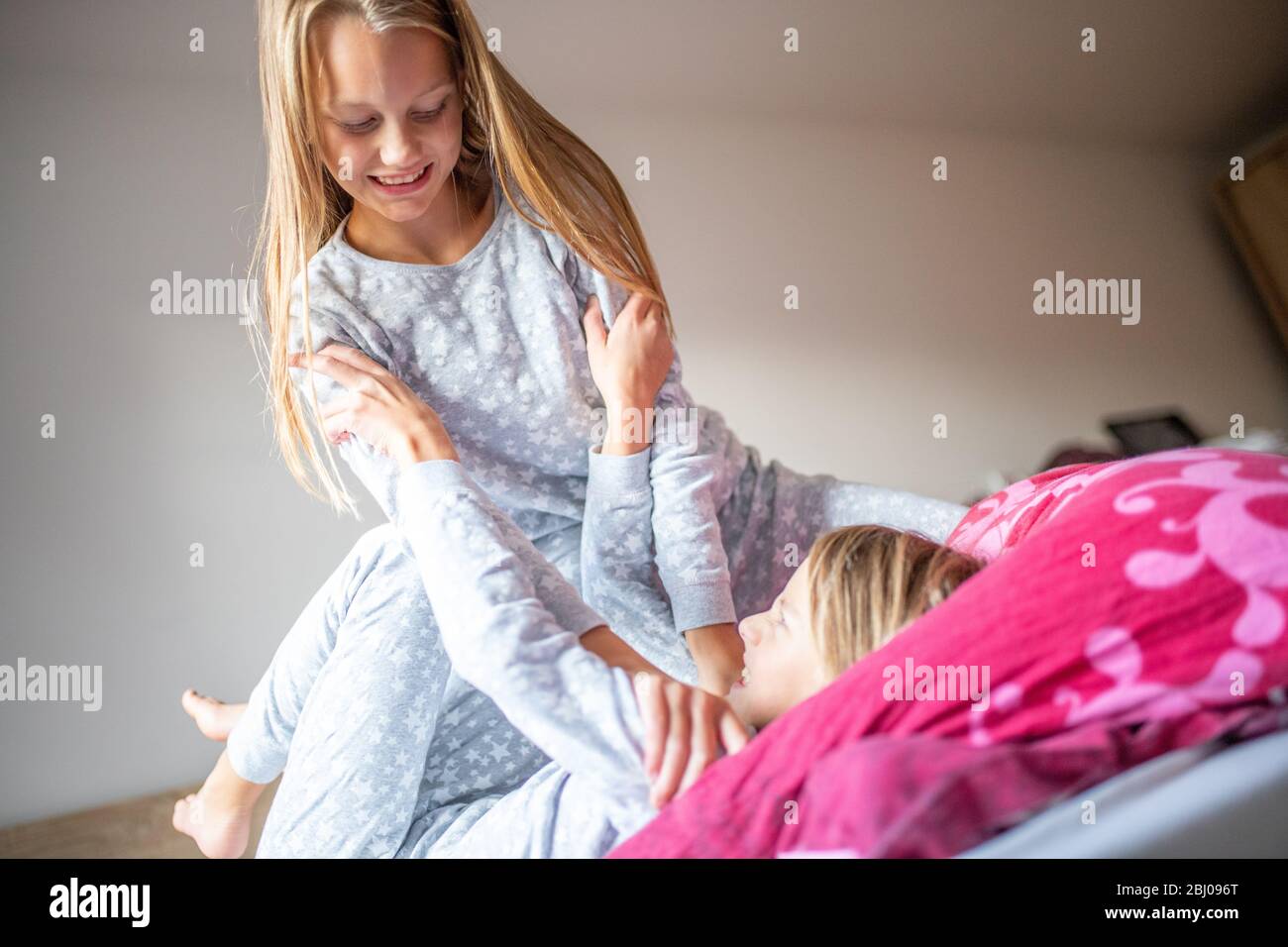 two girls are arguing and fighting with each other Stock Photo
