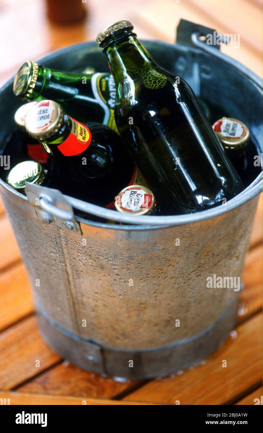 Bottles of beer in a bucket - Stock Photo