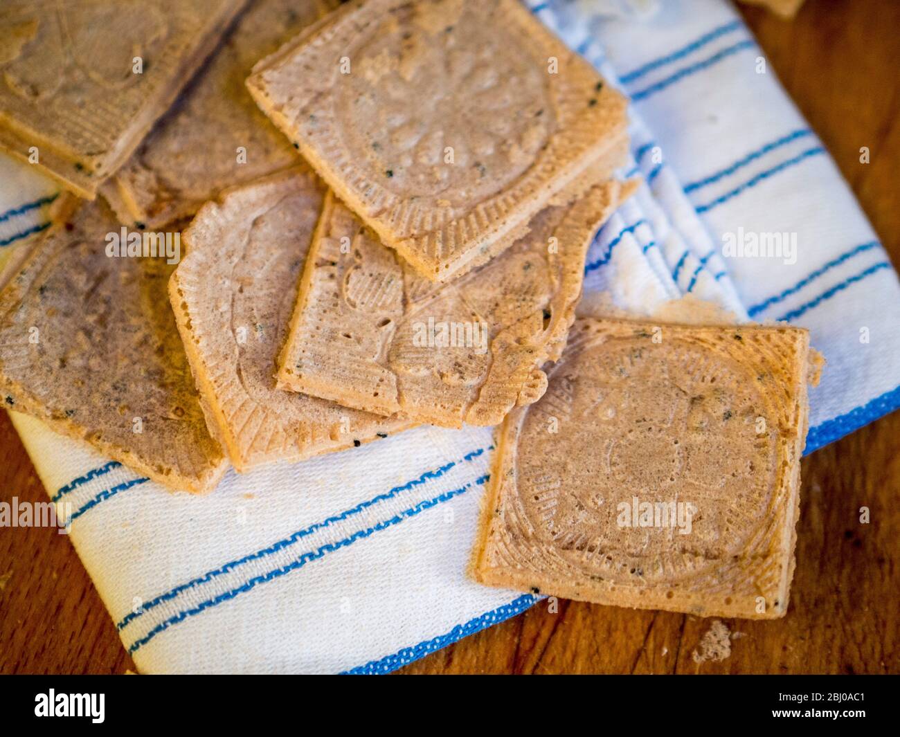 Home made buckwheat crackers, cooked in a German waffle iron. Stock Photo