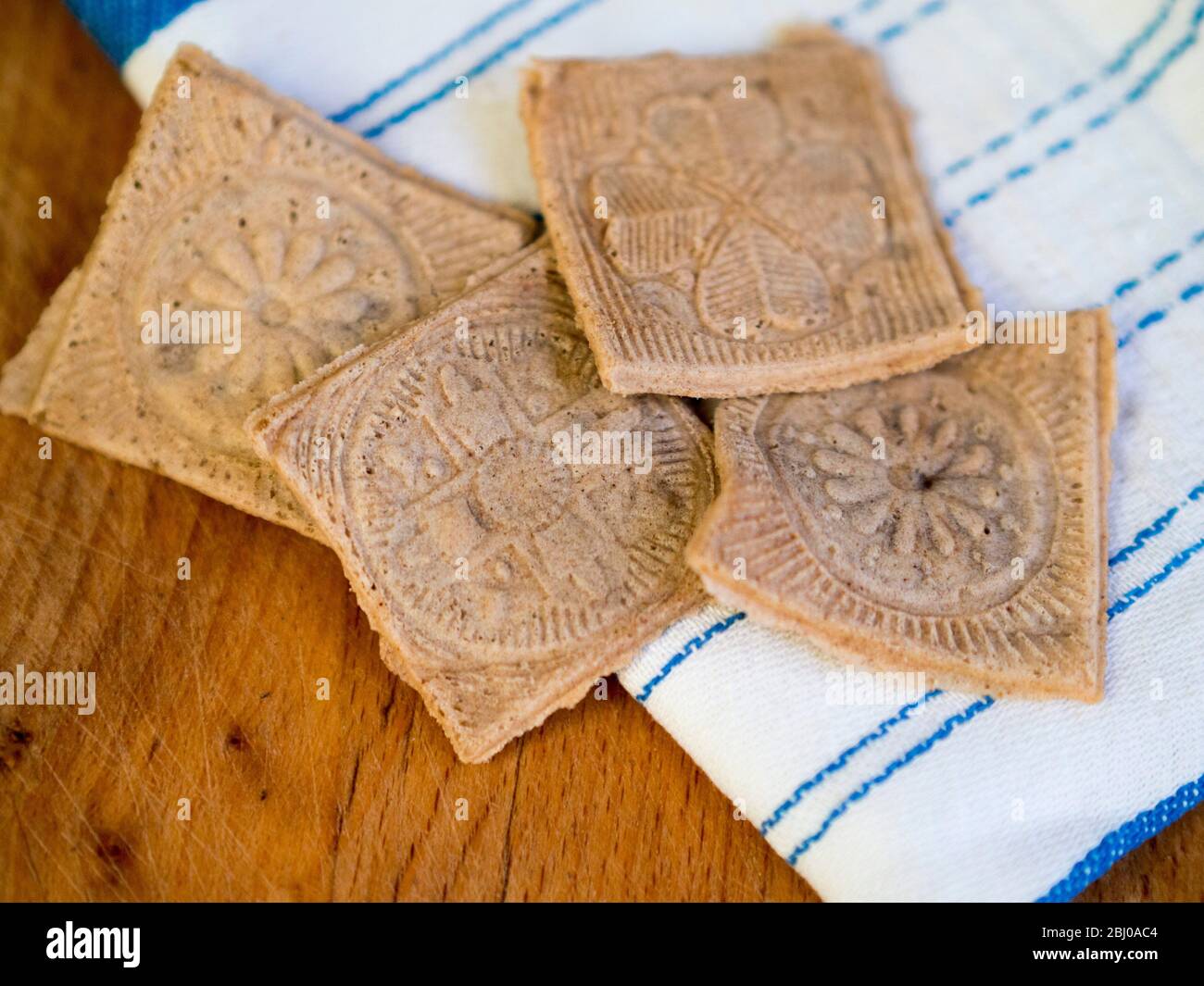 Home made buckwheat crackers, cooked in a German waffle iron. Stock Photo