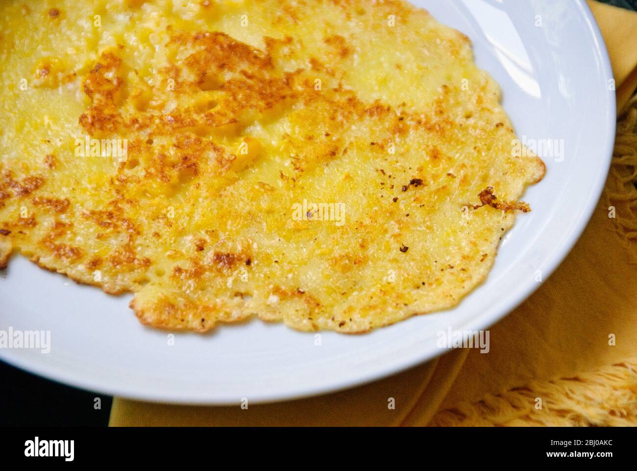 Mexican corn pancake on white plate - Stock Photo