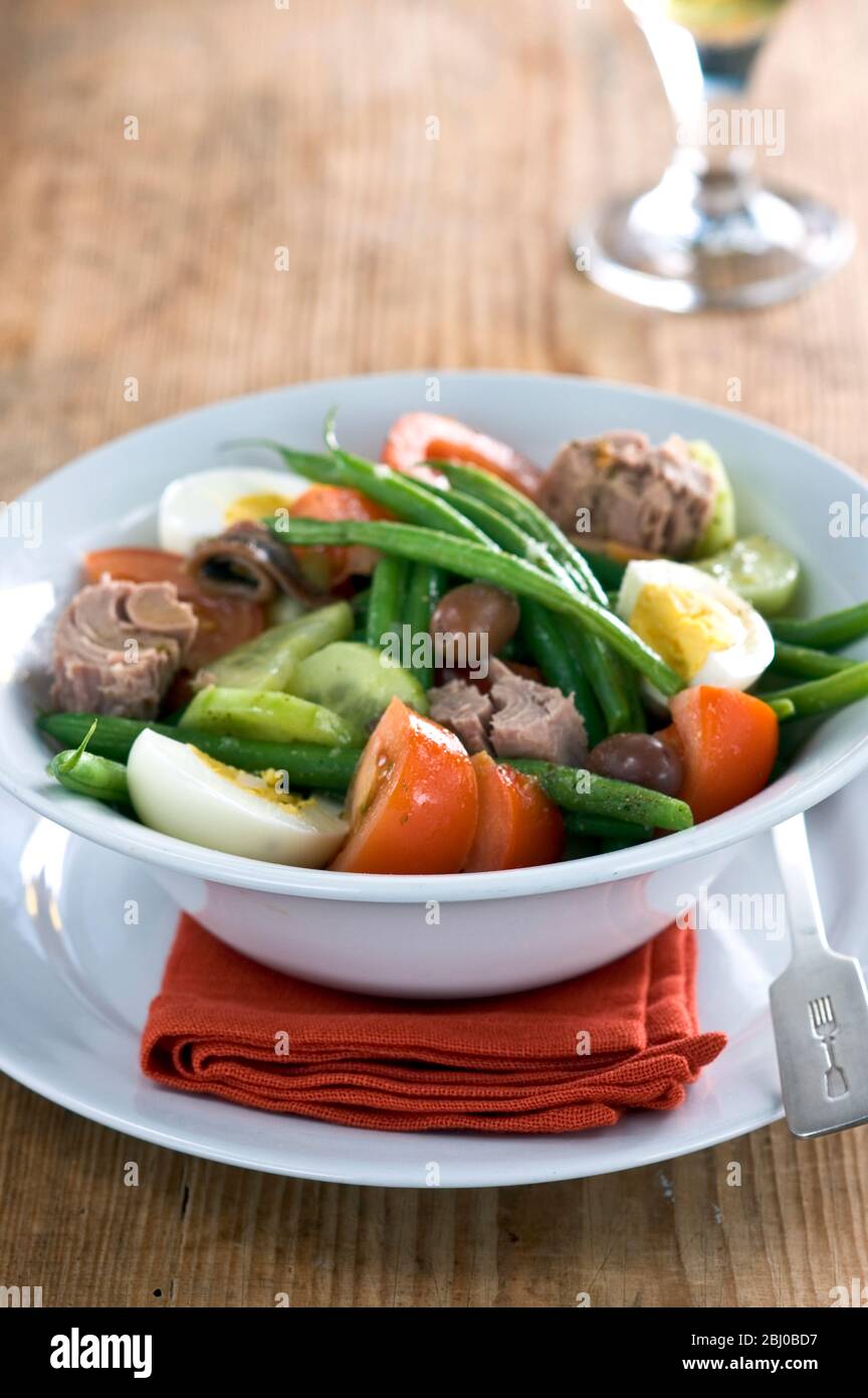 Classic salade Nicoise: tuna, green beans, olives, hardboiled eggs, - Stock Photo