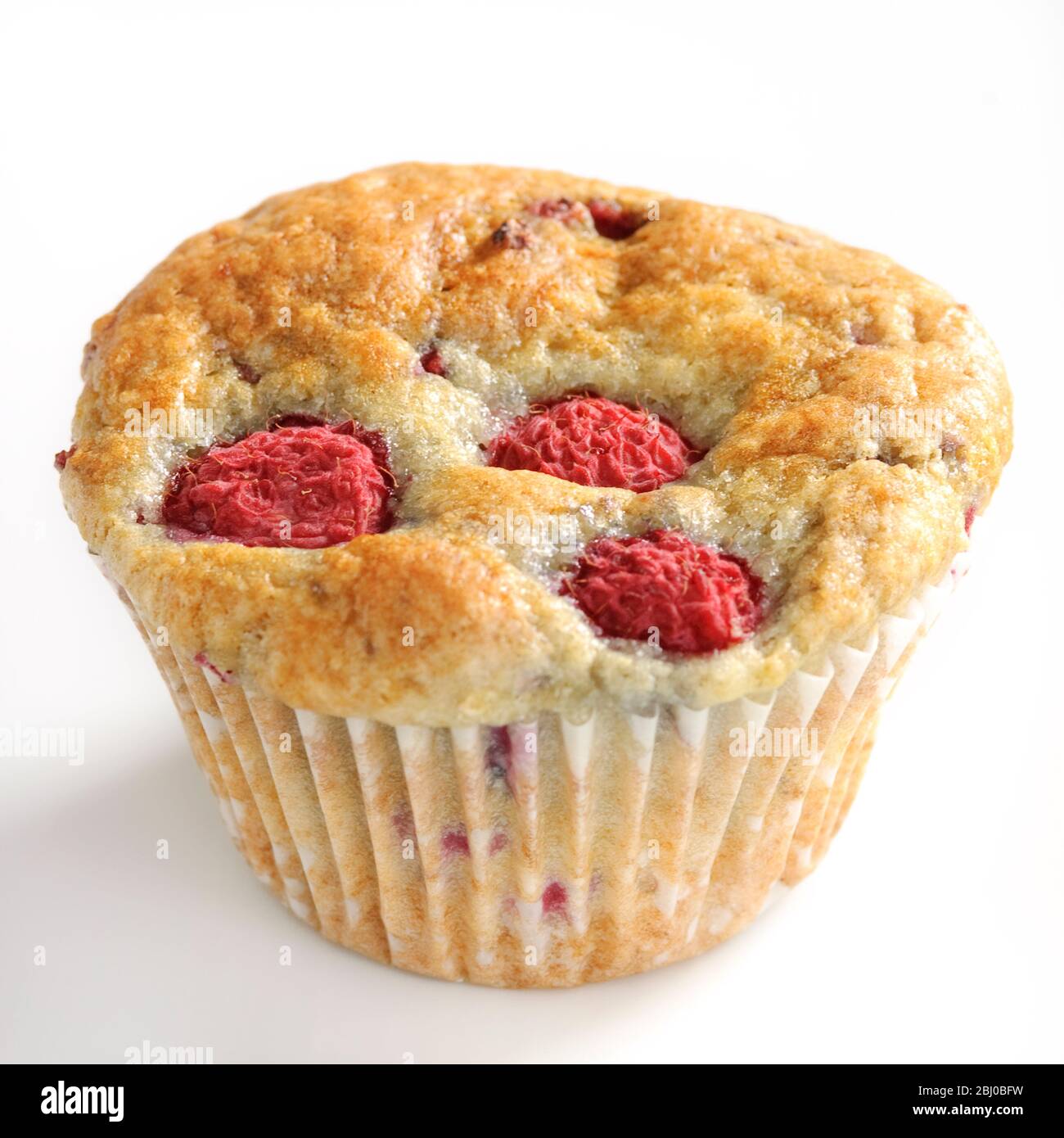 Raspberry muffins on white background - Stock Photo