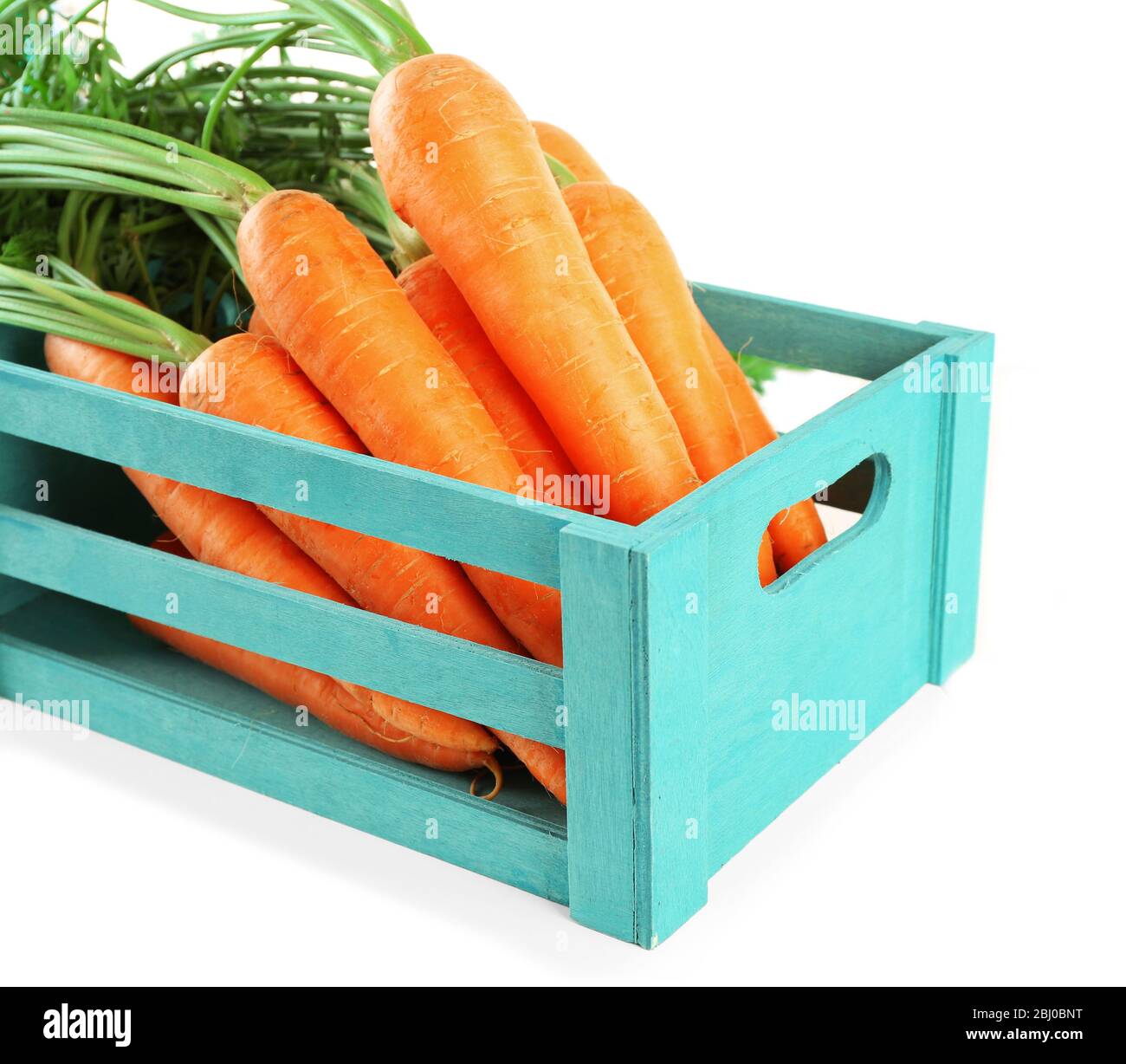 fresh-carrots-in-wooden-crate-isolated-on-white-stock-photo-alamy