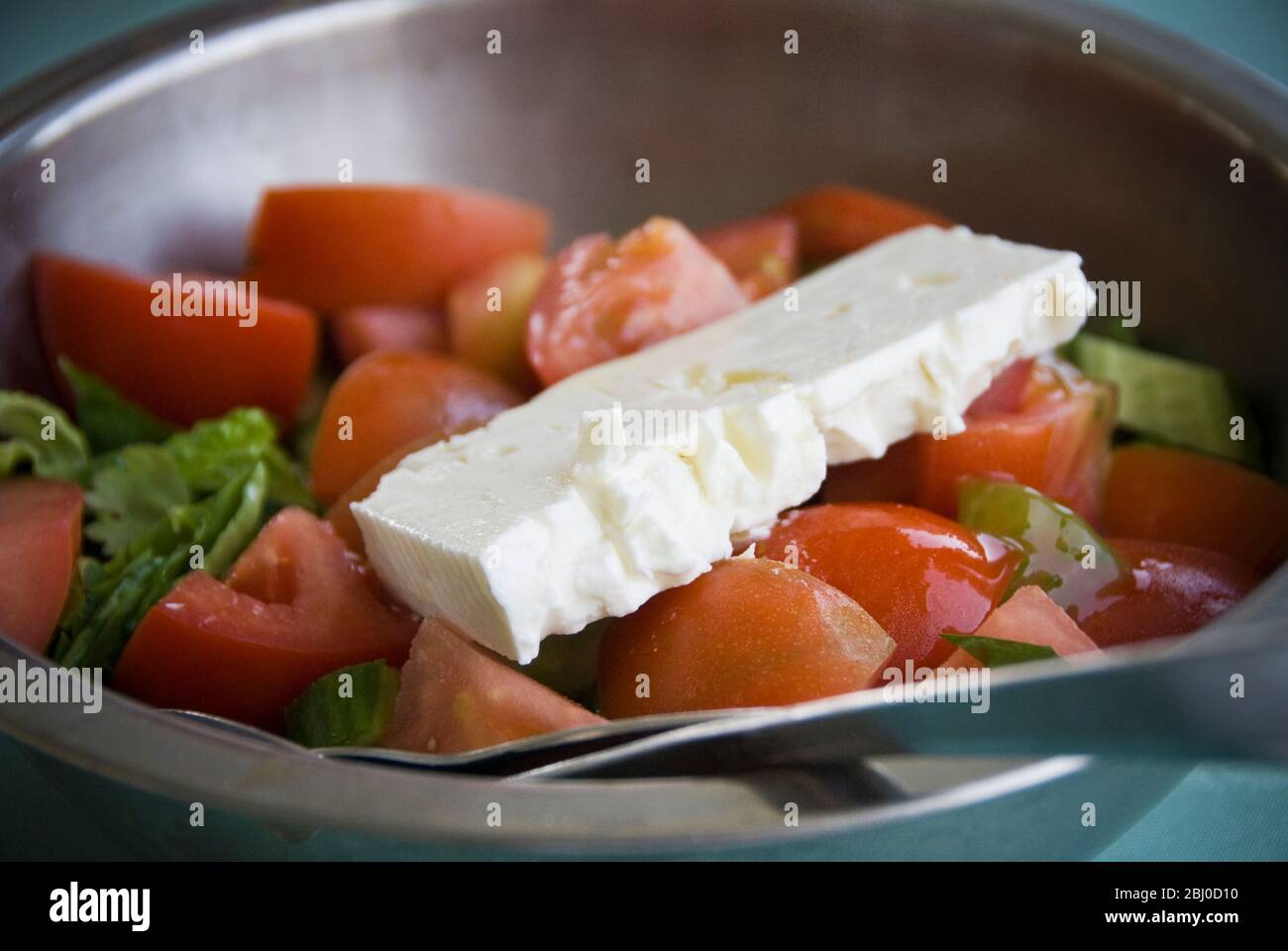 Classic Greek salad served as part of meze in waterfrint restaurant in Larnaca, Cyprus - Stock Photo