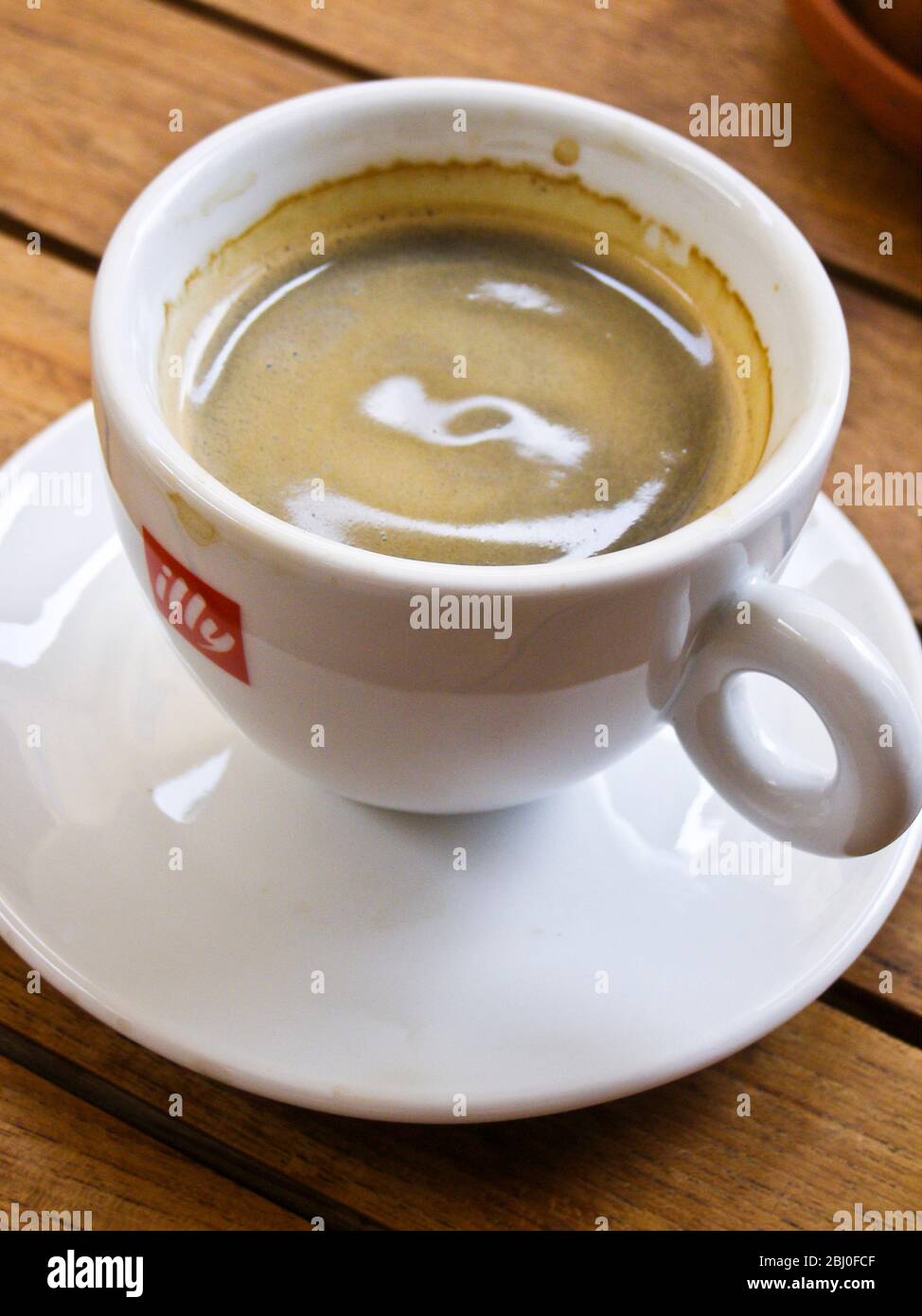 Small cup of espresso coffee in Swedish cafe. - Stock Photo