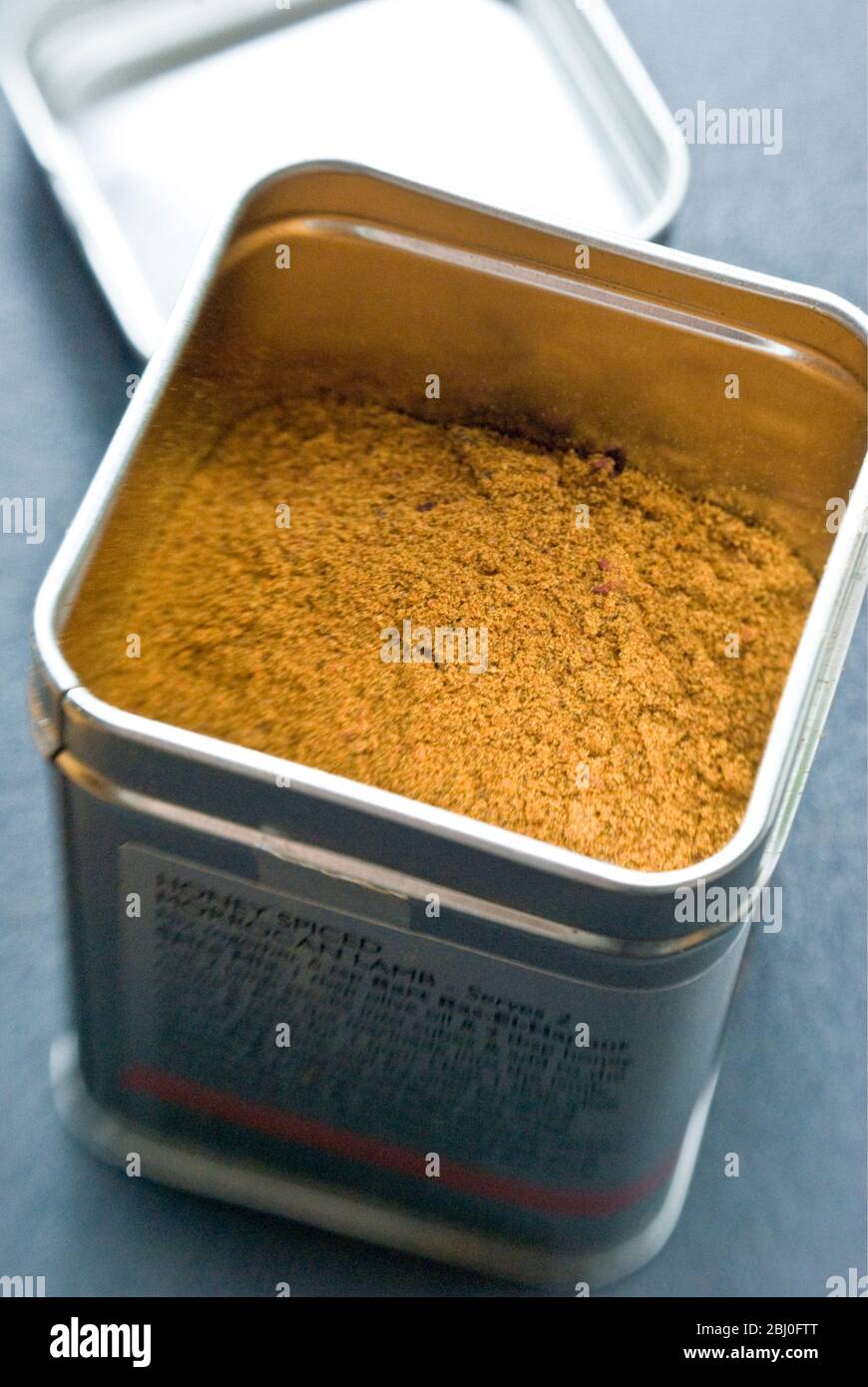 Ras-el-harnout (North African spice mixture) in tin. - Stock Photo