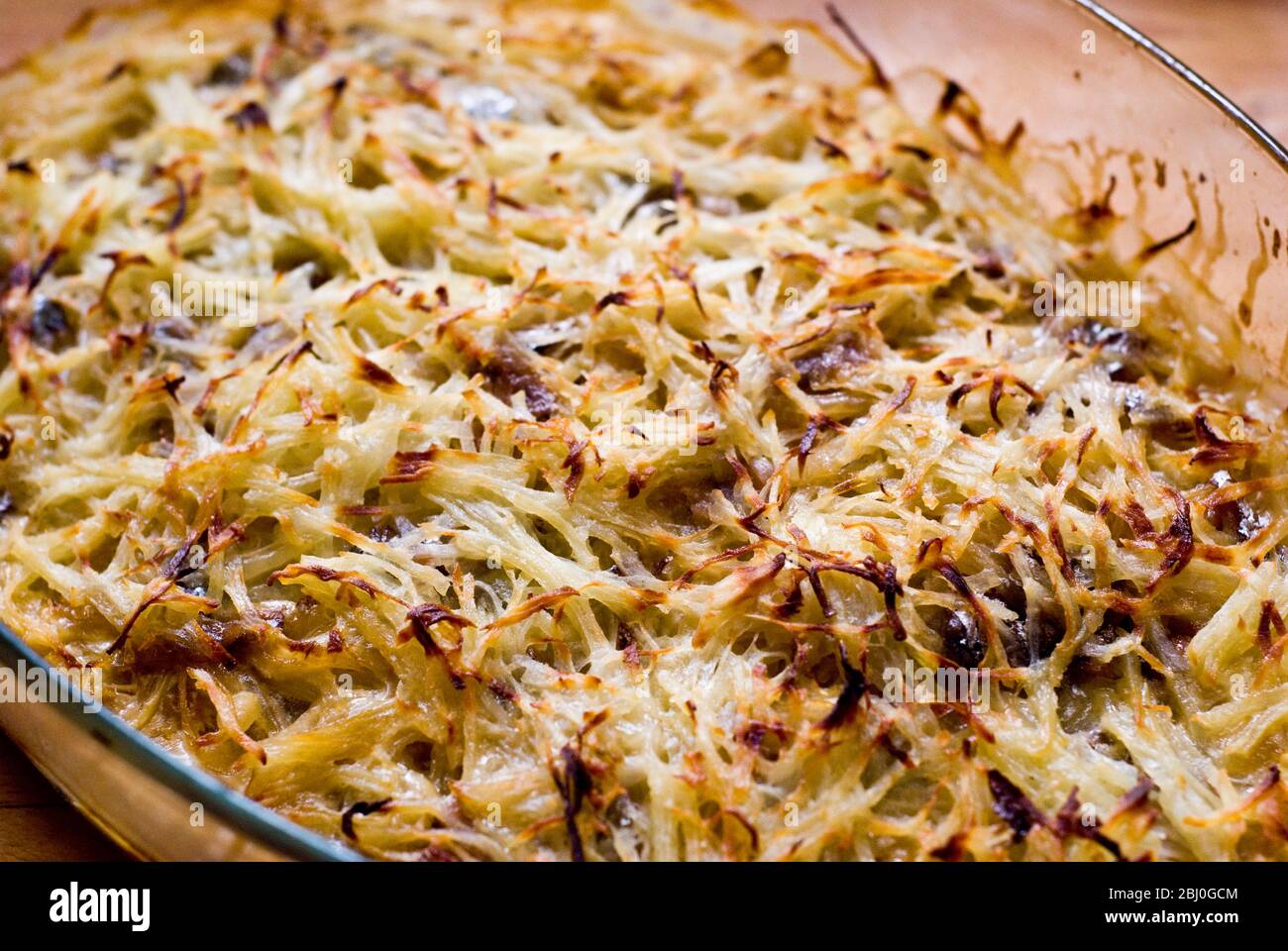 Jansson's Temptation', (Janssons Frestelse) a classic Swedish dish of potato, onion and Swedish 'anchovies', Swedish anchovies are in fact salted spra Stock Photo