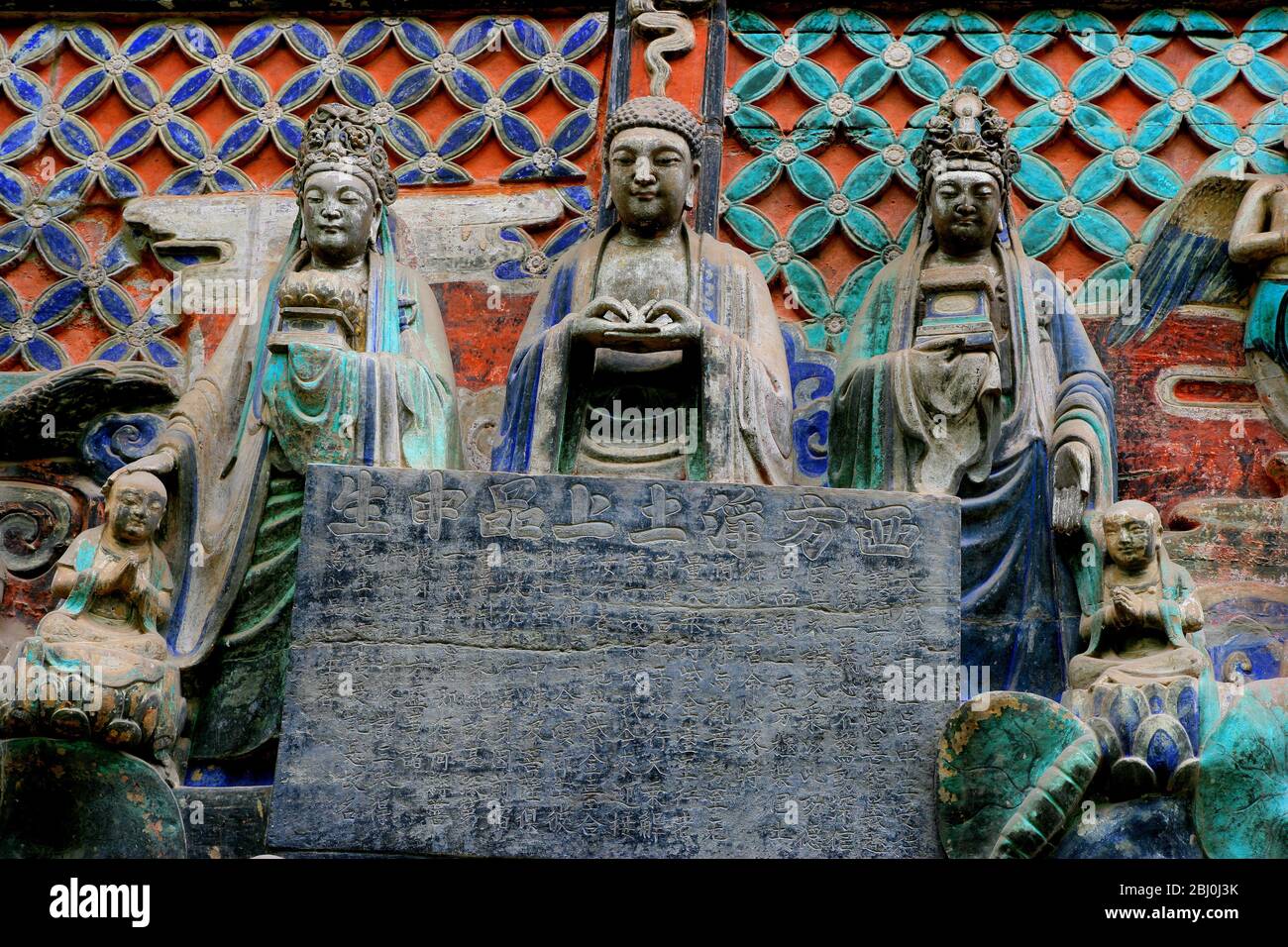 Look at the top middle class statue (Southern Song Dynasty) in theThree Pins and Nine Thousands of Life picture in disguised form of Wuliangshou Buddh Stock Photo