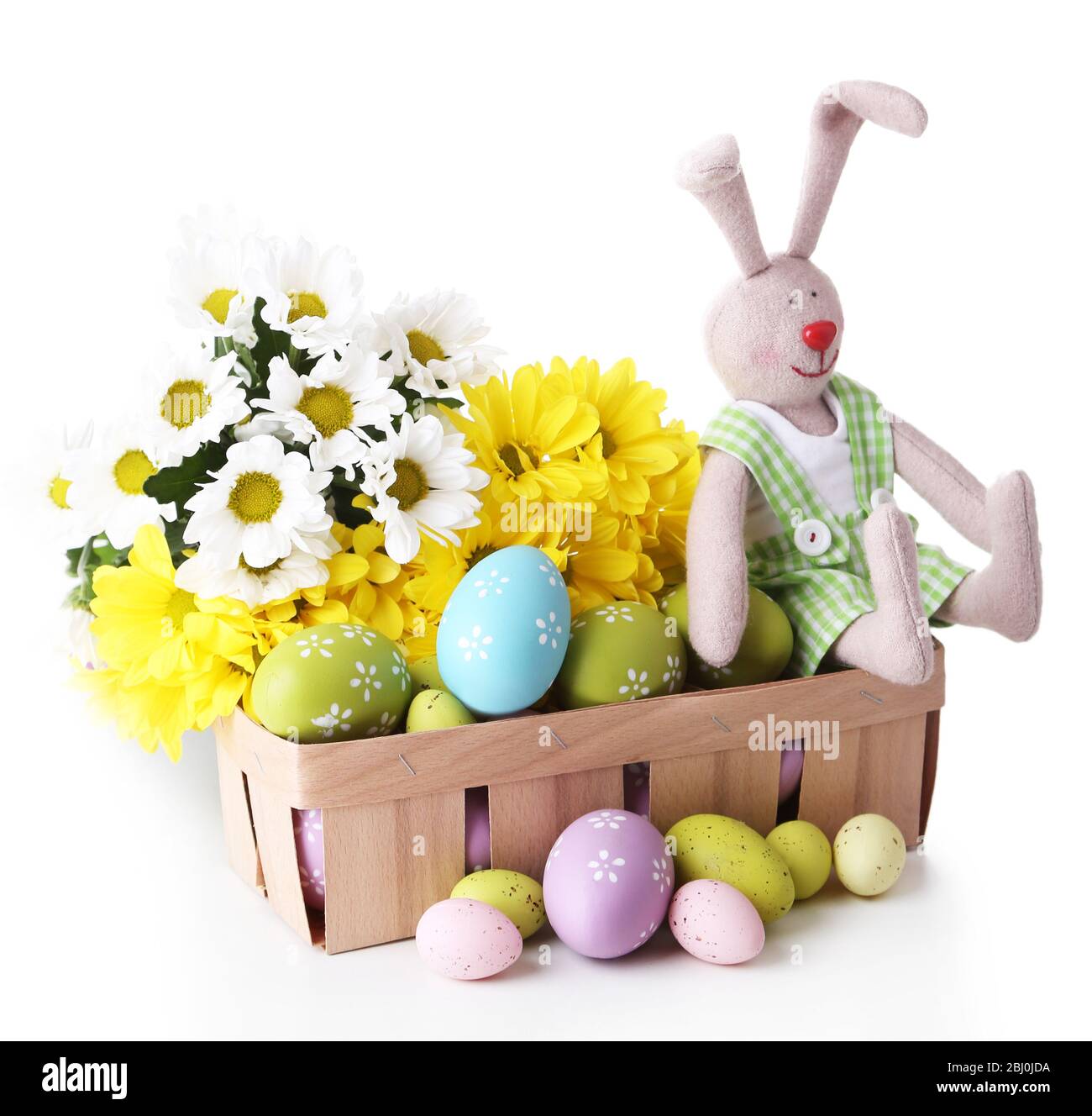 Easter bunny with painted Easter eggs with flowers on white background ...