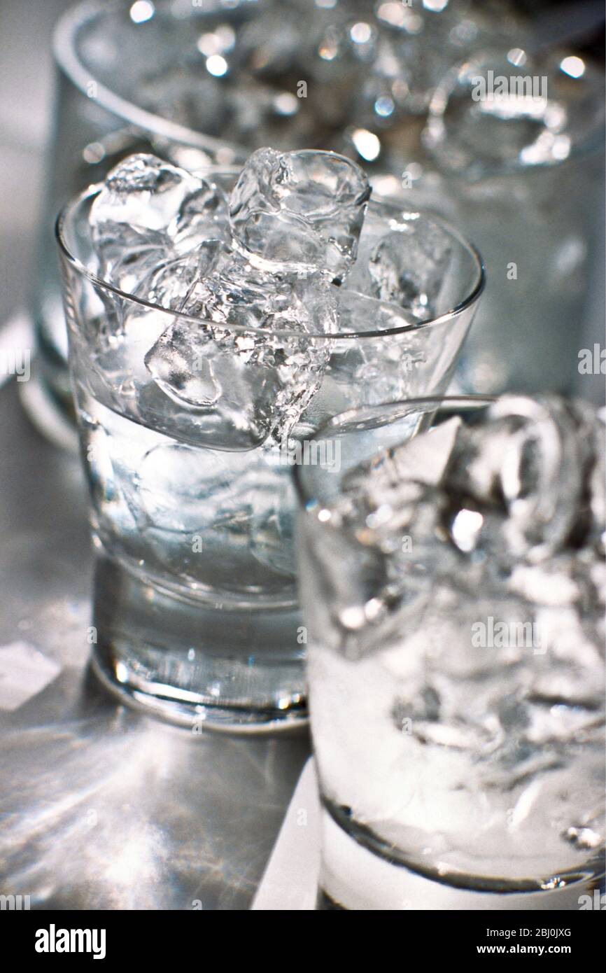 Glasses of vodka tonic on ice - Stock Photo