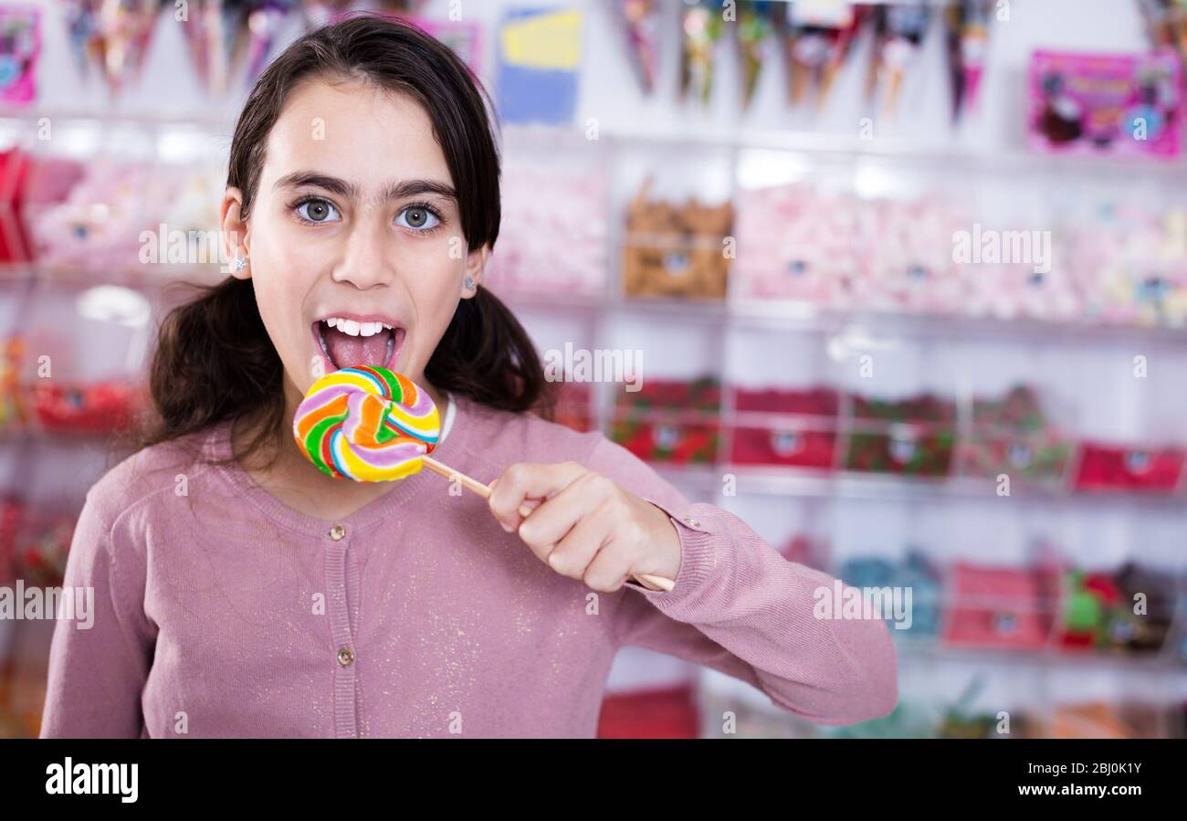 Happy child sweets lolly hi-res stock photography and images - Alamy