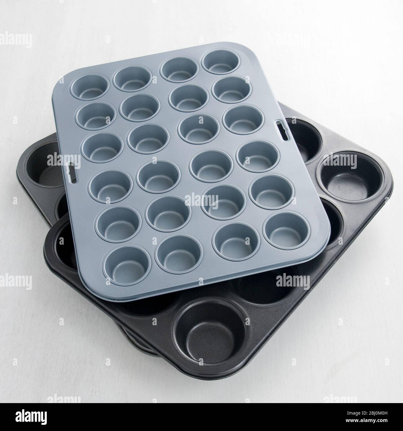 Non-stick metal muffin baking tins - Stock Photo