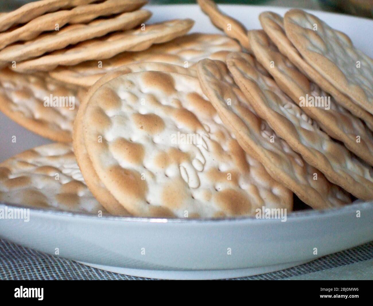 Plate of Carrs water biscuits to serve with cheese - Stock Photo