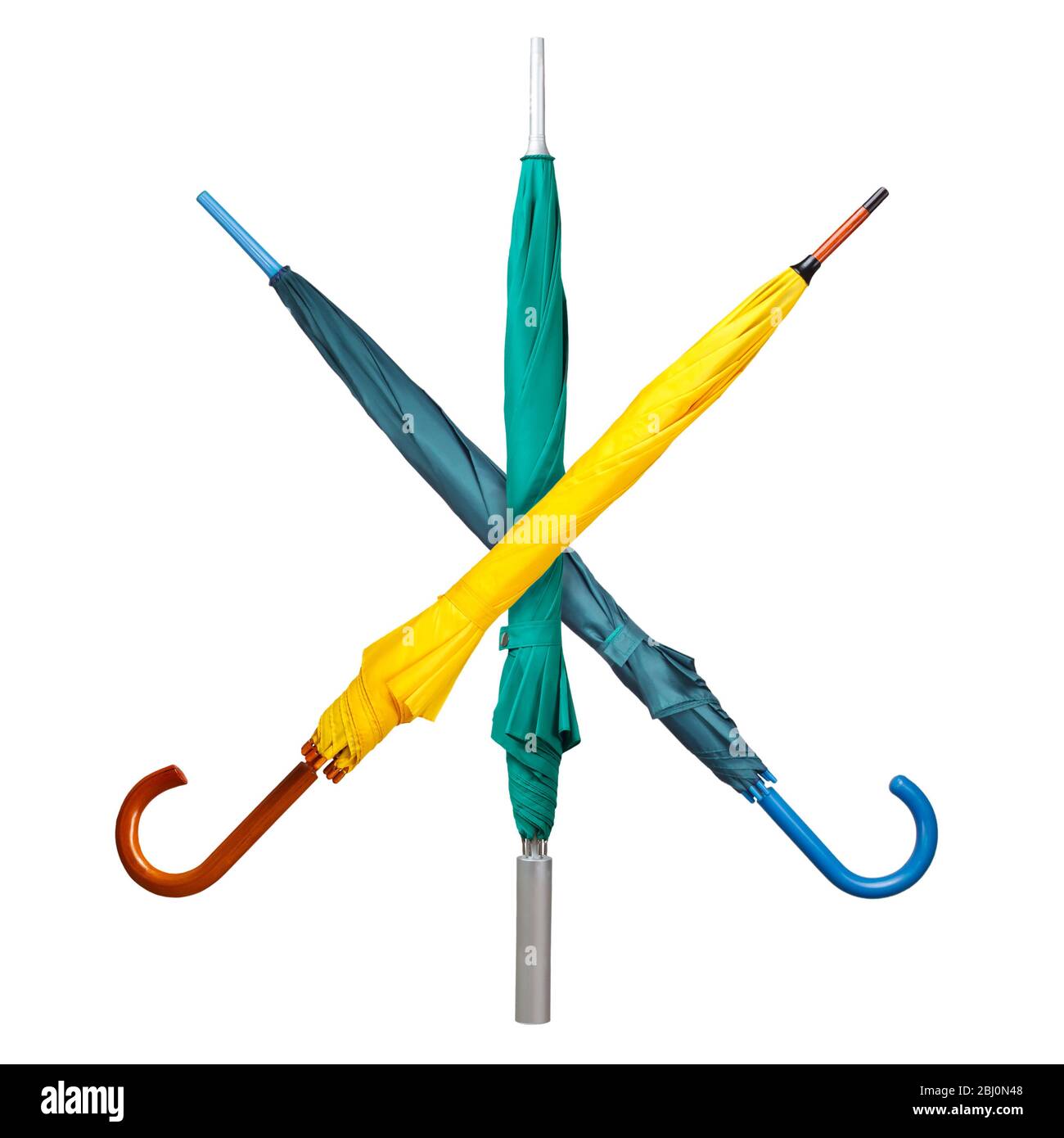 Crossed umbrellas on white Stock Photo