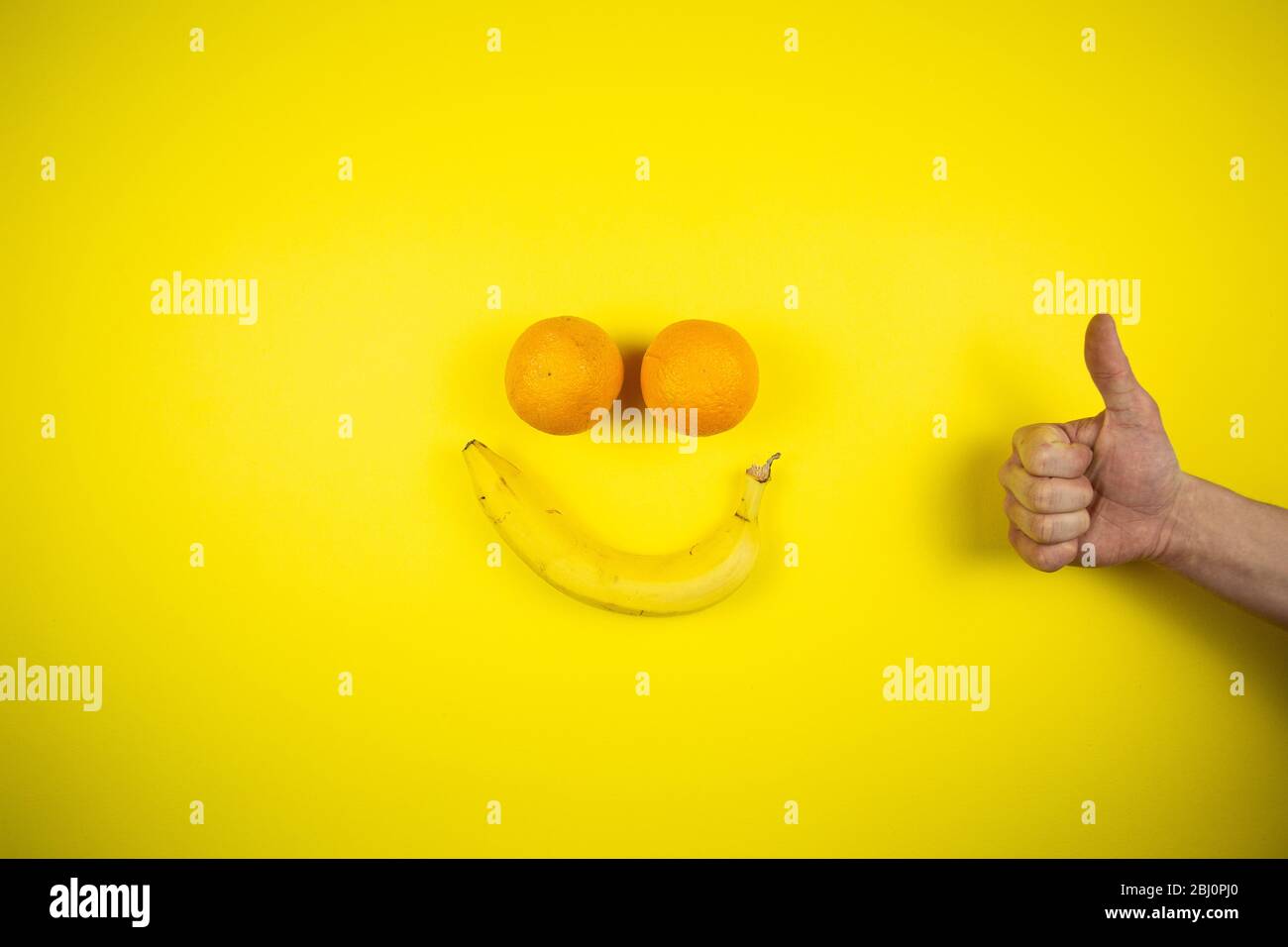 banana and oranges in the form of a smile Stock Photo