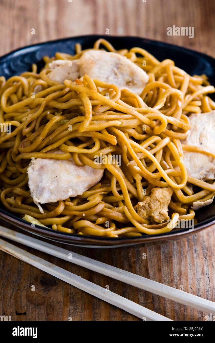 Soba noodles with chicken fillet - Stock Photo